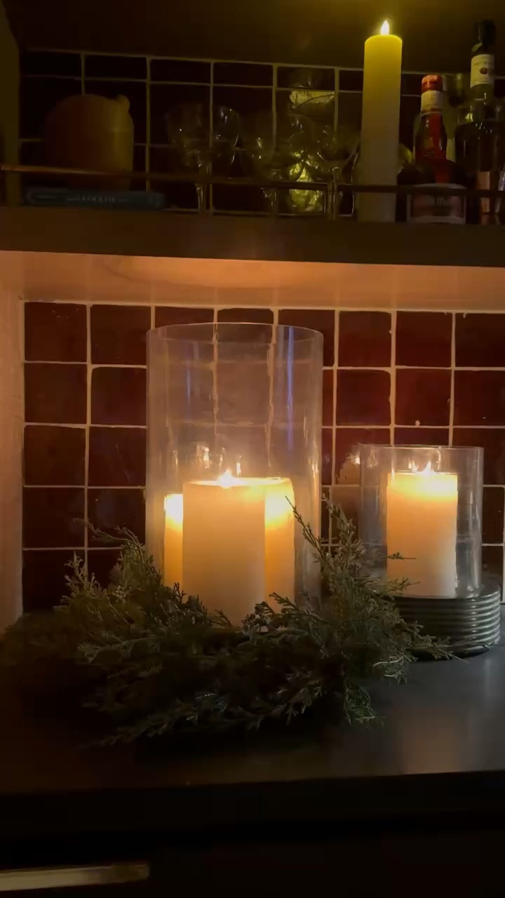 My faux wreaths fit perfectly around large hurricanes and is such a fun and unexpected holiday styling tip! 

#LTKSeasonal #LTKHome #LTKHoliday