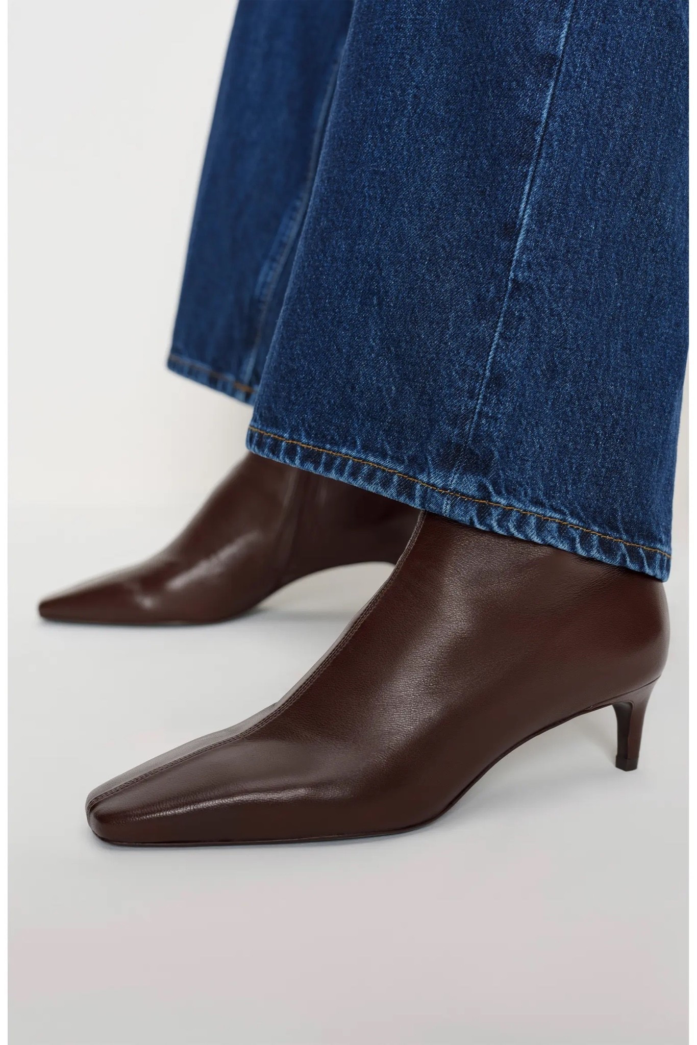 These remind me of the Khaite boots that everyone loves, which cost over $1,000! These Reformation ones are super stylish, reasonably priced, and the heel height is perfect for wearing every day.