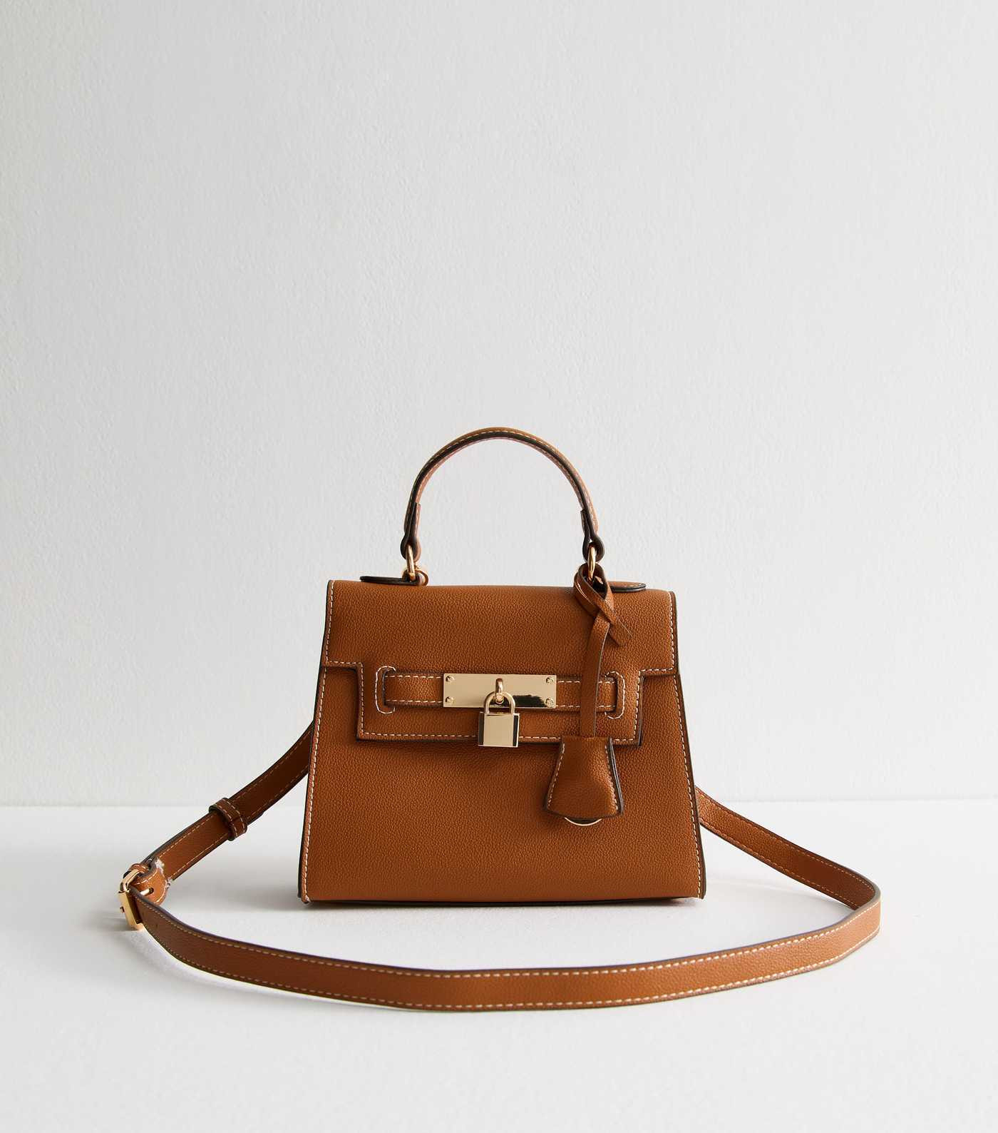 Tan Faux Leather Top Handle Crossbody Bag
						
						Add to Saved Items
						Remove from Saved... | New Look (UK)