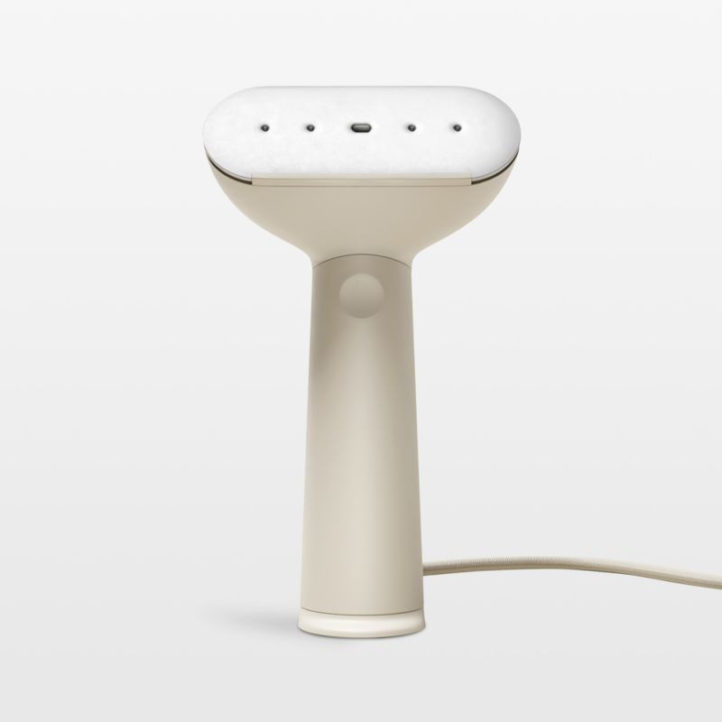 Steamery Cirrus No.3 Sand Handheld Clothes Steamer | Crate & Barrel | Crate & Barrel