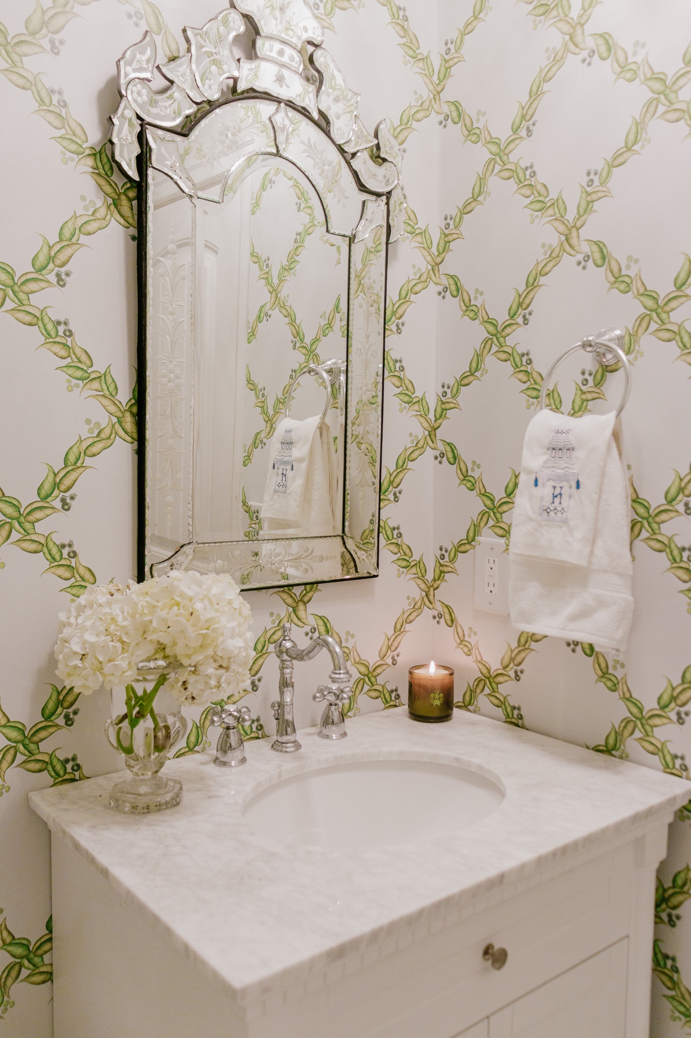Our powder bathroom is DONE!! She’s beautiful… 

Polished chrome faucet carrara marble vanity bathroom mirror trellis chinoiserie wallpaper bathroom Reno 

#LTKHome