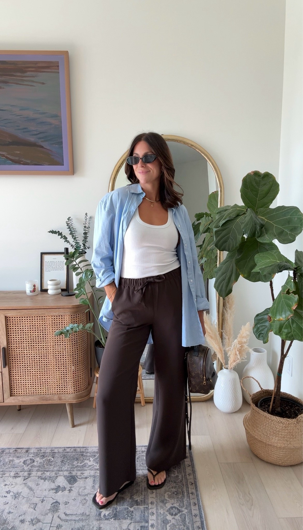 Cozy chic ootd idea Pants
Brown pants for fall from Aritzia wearing size small
Tank top is also from Aritzia size small
Blue button up is from H&M and I’m wearing a size small 
Flip-flops are from Aritzia and the sunglasses are from Amazon

#LTKcanada #LTKfall #LTKstyletip