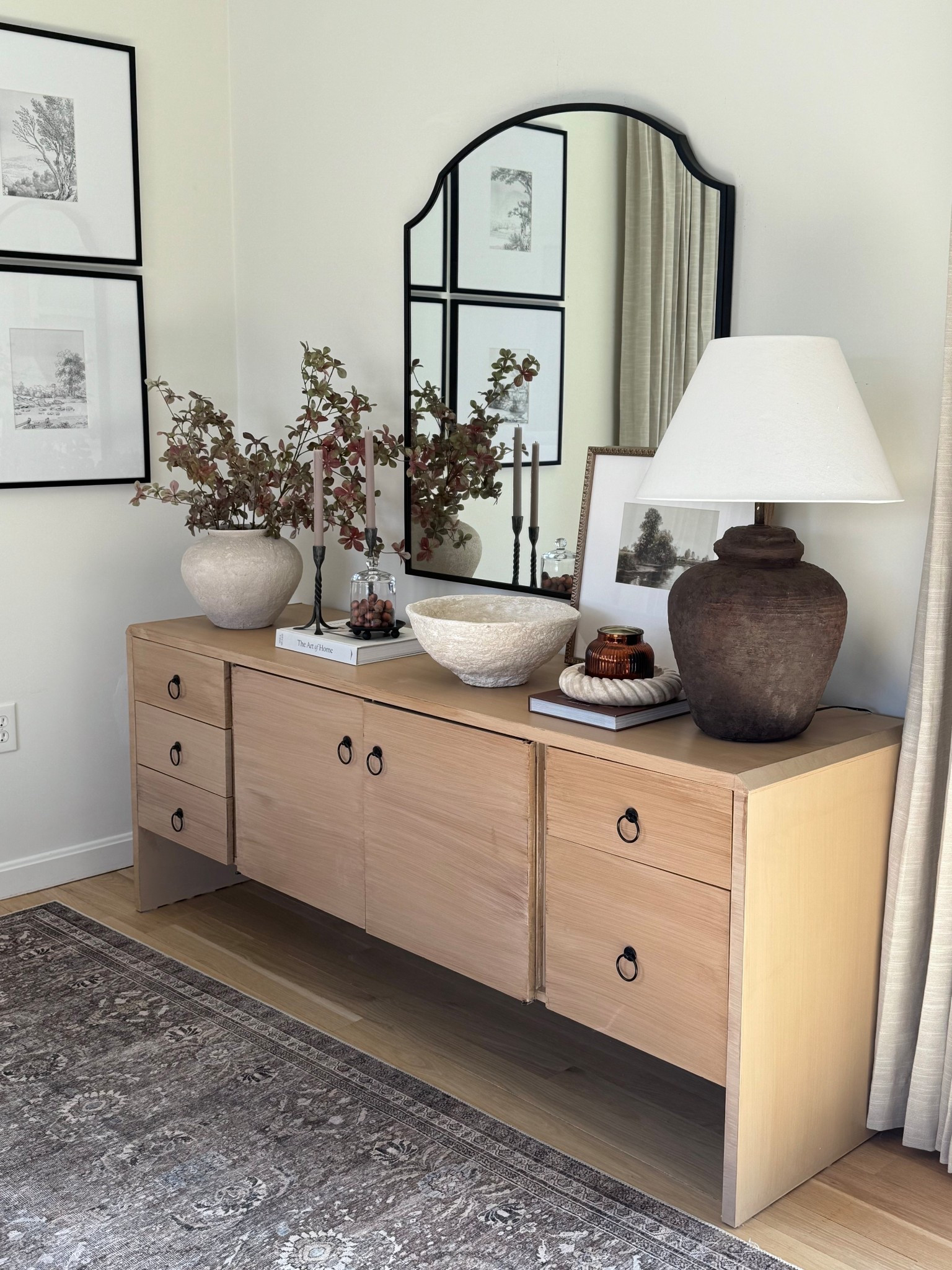 Console styling! I am eager to get my house back to before Christmas! It’s a slow process! I will be adding in some greenery here soon. Lamp, vase, wall mirror, gallery frames, cloch 

#LTKHome #LTKSaleAlert #LTKSeasonal