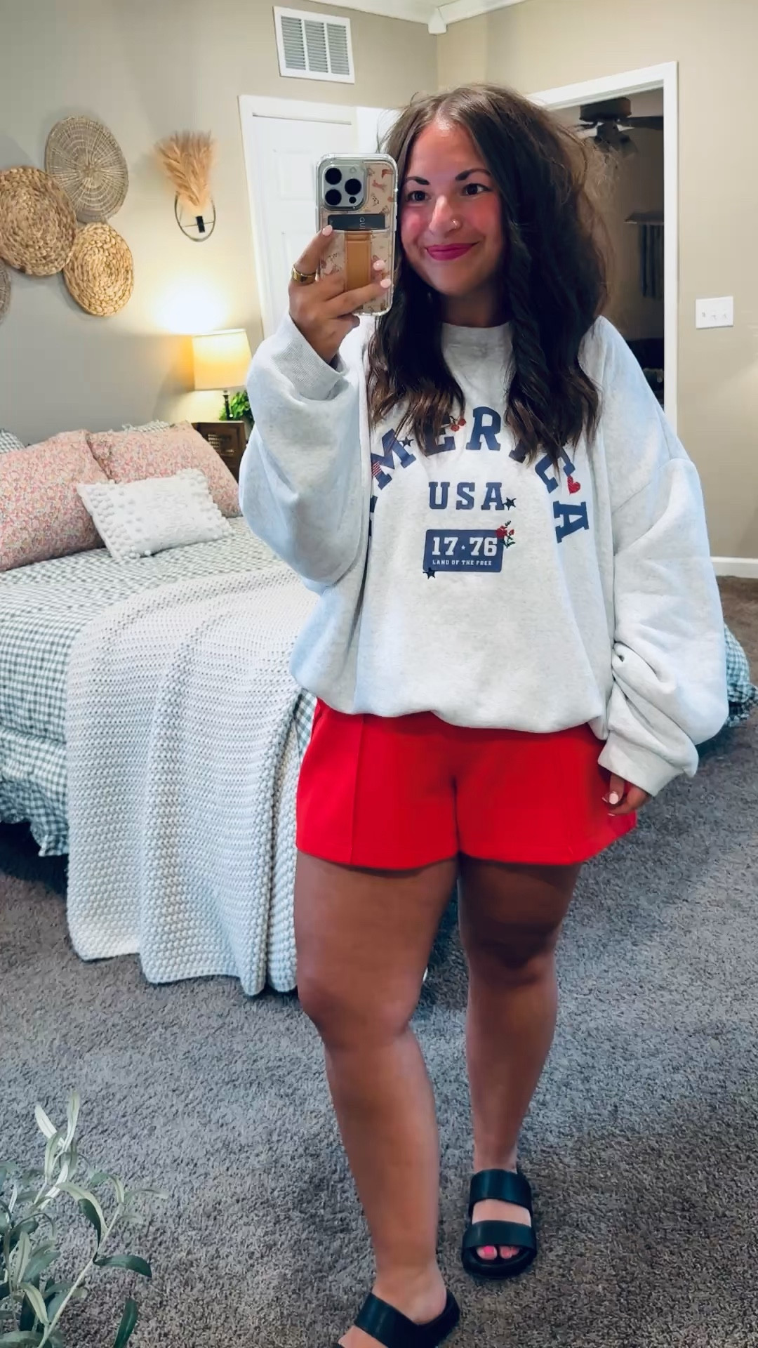 Simple, comfy, and a little festive ❤️ this America crewneck & shorts set is perfect for everything from errands to fireworks!

sandals: sold out, but linking similar options below!
shorts: fit true to size // wearing a large
crewneck: fits oversized // wearing an XL 

 #LTKootd #LTKMidsize