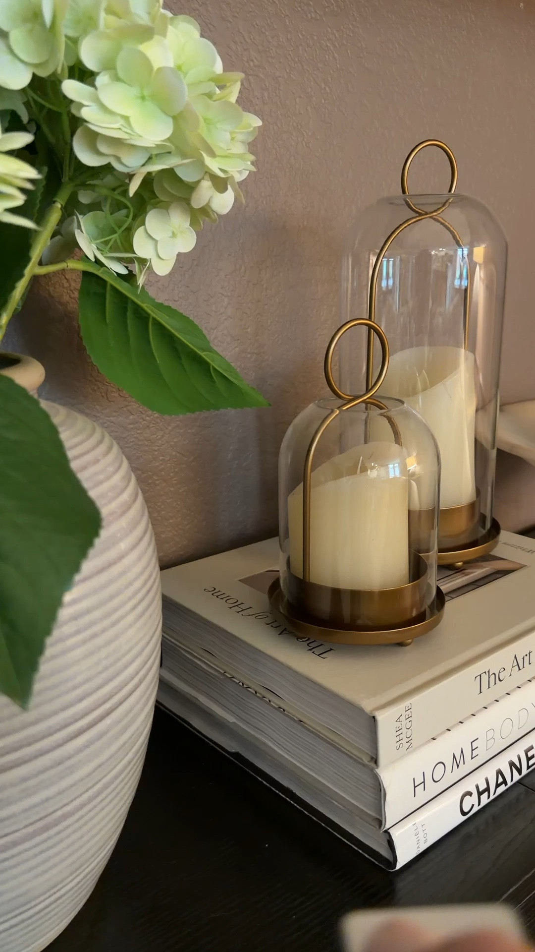 Simple shelf styling, decor books , hydrangeas, pottery, candles 

#LTKHome #LTKdayinmylife #LTKSeasonal