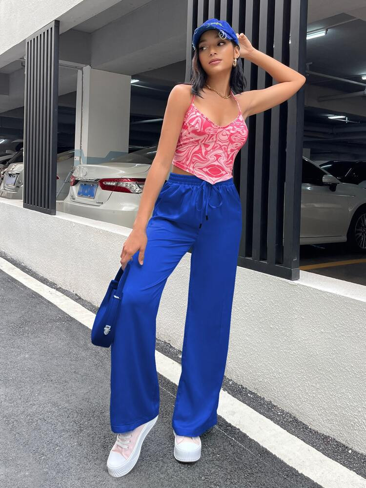 SHEIN EZwear Drawstring Waist Slant Pocket Satin Pants
       
              
              $12.9... | SHEIN