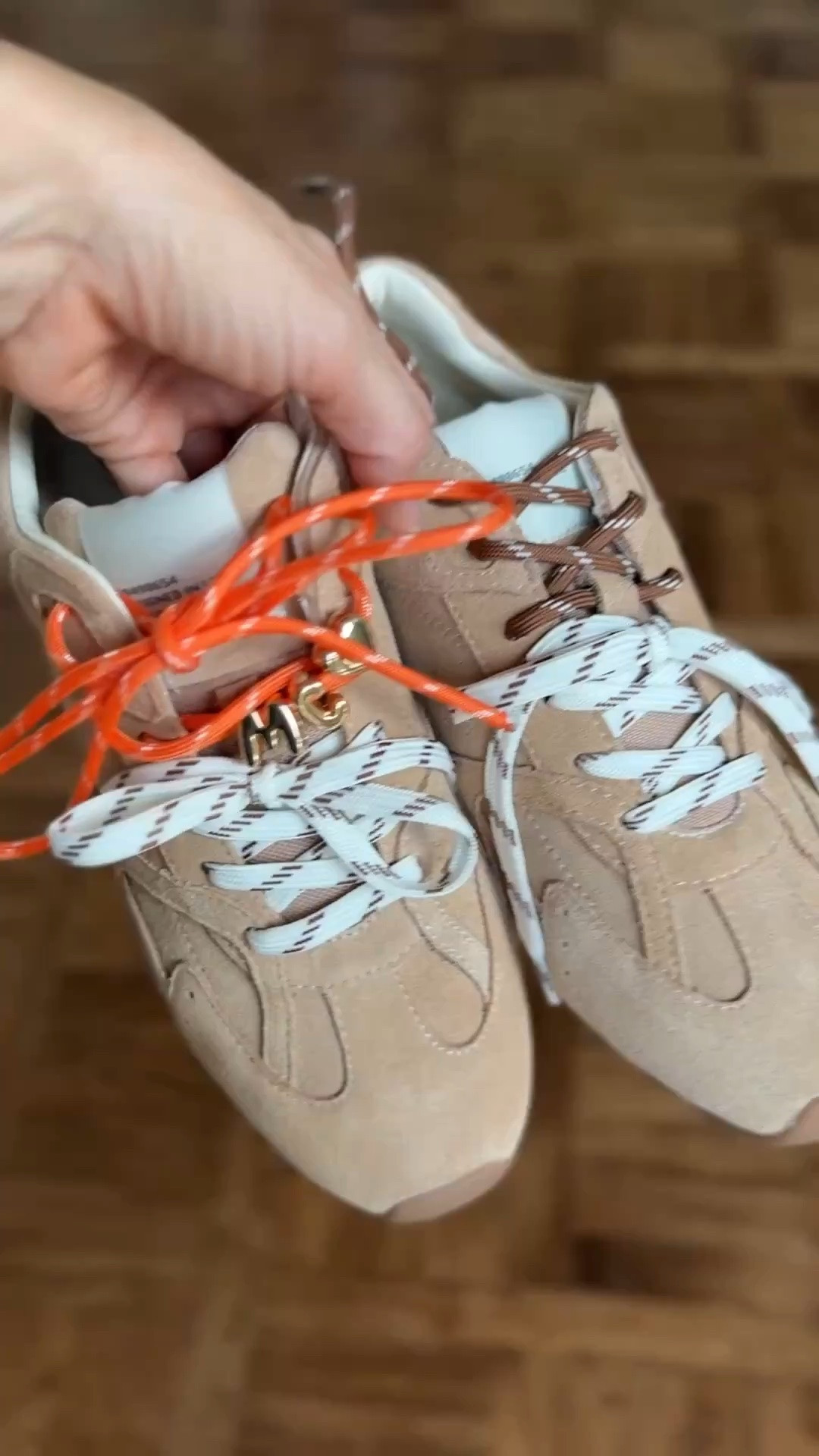 These are so comfy! Wearing them on our Switzerland trip! 
I swapped out one of the brown laces for an orange cord from this friendship bracelet kit- and slid on some charms from the kit too! Love how it turned out! I sized up 2 sizes on the sneakers!

#LTKgrwm #LTKmomlife #LTKootd