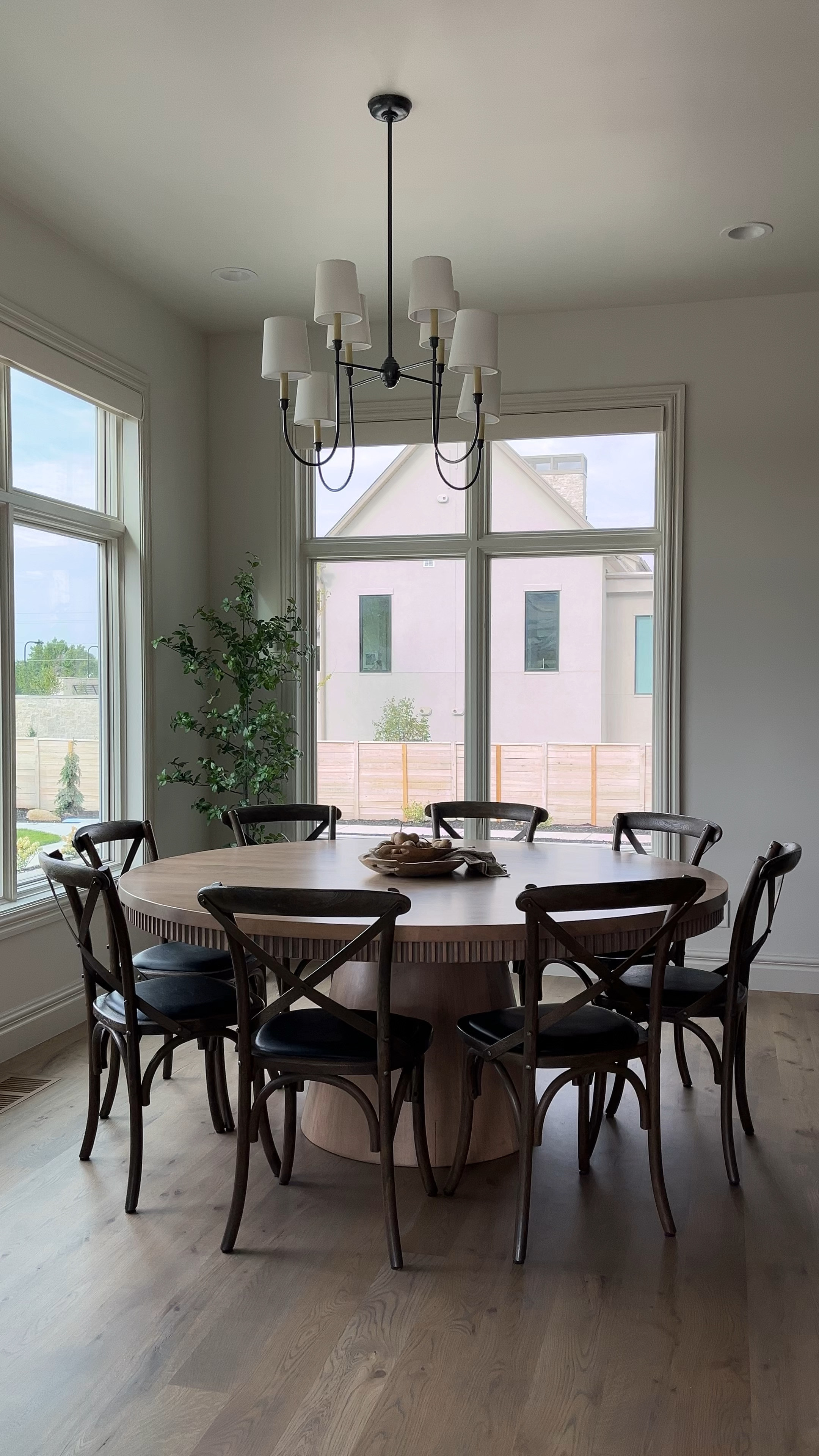 Dining Nook with bistro dining chairs that are kid-friendly, gorgeous light fixture and faux artificial trees and decor. The table is from Primrose Lifestlye and not linkable on LTK.

#diningroom #diningchair #chandelier

Chandelier, traditional home, dining nook, dining chairs

#LTKHome #LTKSaleAlert #LTKVideo
