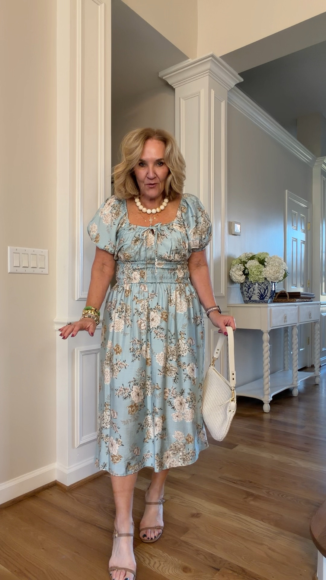 Spa blue floral dress wearing a medium petite
The neck line is a titch wide. I will probably need to put in a little micro stitch to hold it in place so it doesn’t show my bra 
Sandals are true to size their leg, lengthening, and very delicate looking
20% off my bracelets with code NANETTE20
Necklace is 25% off! 

Easter dress shower, dress blue floral vacation dress spring break wedding shower

#LTKSaleAlert #LTKSeasonal #LTKOver40