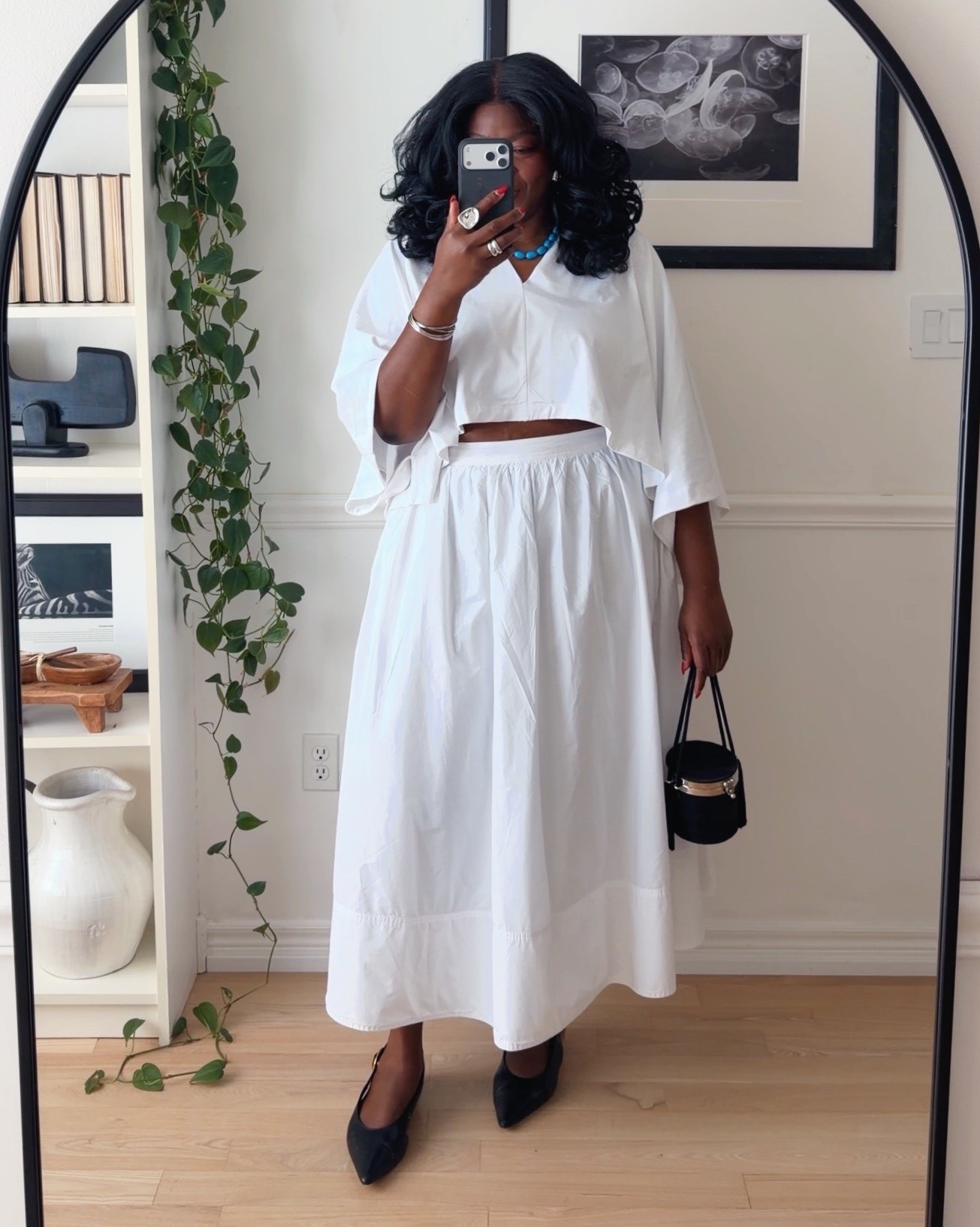 This cute little cape top is so beautiful. I am wearing a M/l. I also linked to a few similar skirt to recreate this look

#LTKsummer #LTKplussize #LTKmidsize