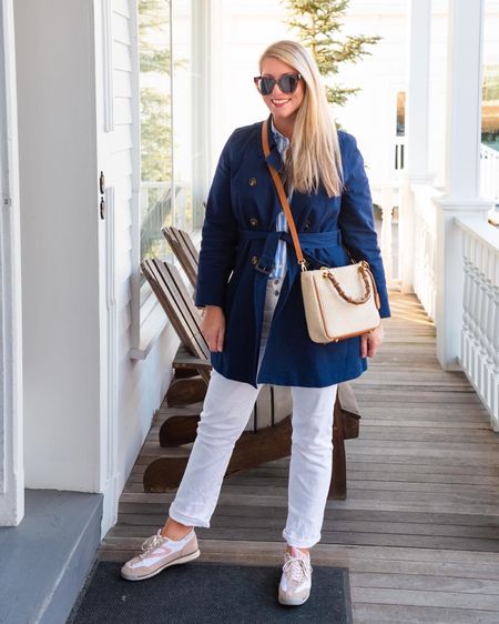 Spring outfit perfect for weekends out & about during the day. Trench coat in navy, white straight jeans (tall length available), striped shirt, Tretorn sneakers, raffia and bamboo bag, tortoise sunglasses.

#spring style, spring outfit, women’s trench coat, navy trench coat, blue trench coat, white jeans tall, button fly white jeans, straight fit white jeans, blue and white striped shirt, raffia bamboo bag, Mark & Graham, J Crew

#LTKitbag #LTKFind #LTKSeasonal