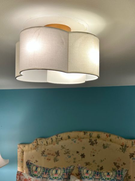 Quatrefoil light for $40! Such an improvement to the ugly boob lights that were here!