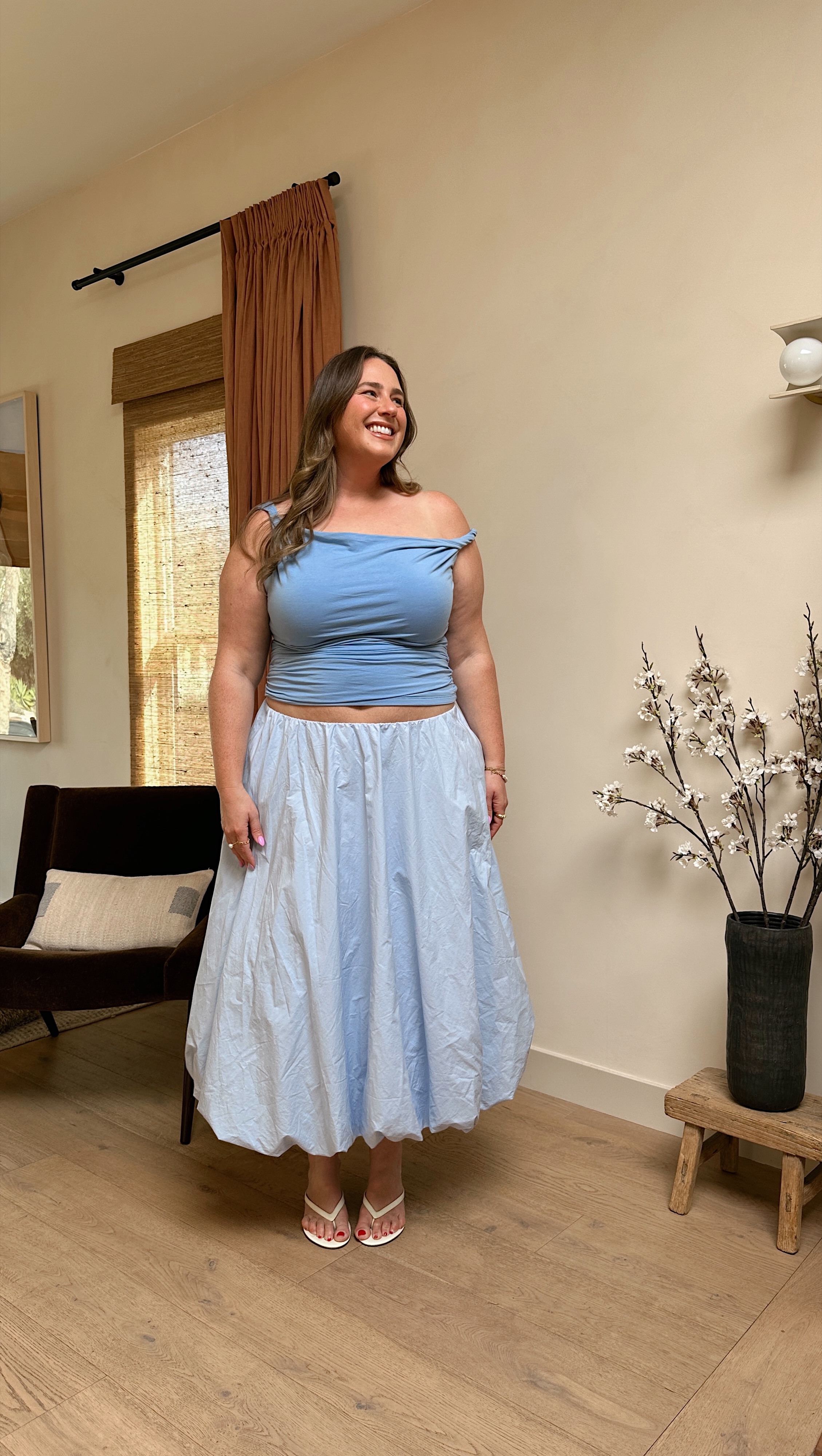 I’m wearing a size XL in the top and skirt. I’m also linking my fav strapless bra! 

#LTKMidsize #LTKFindsUnder100 #LTKSaleAlert