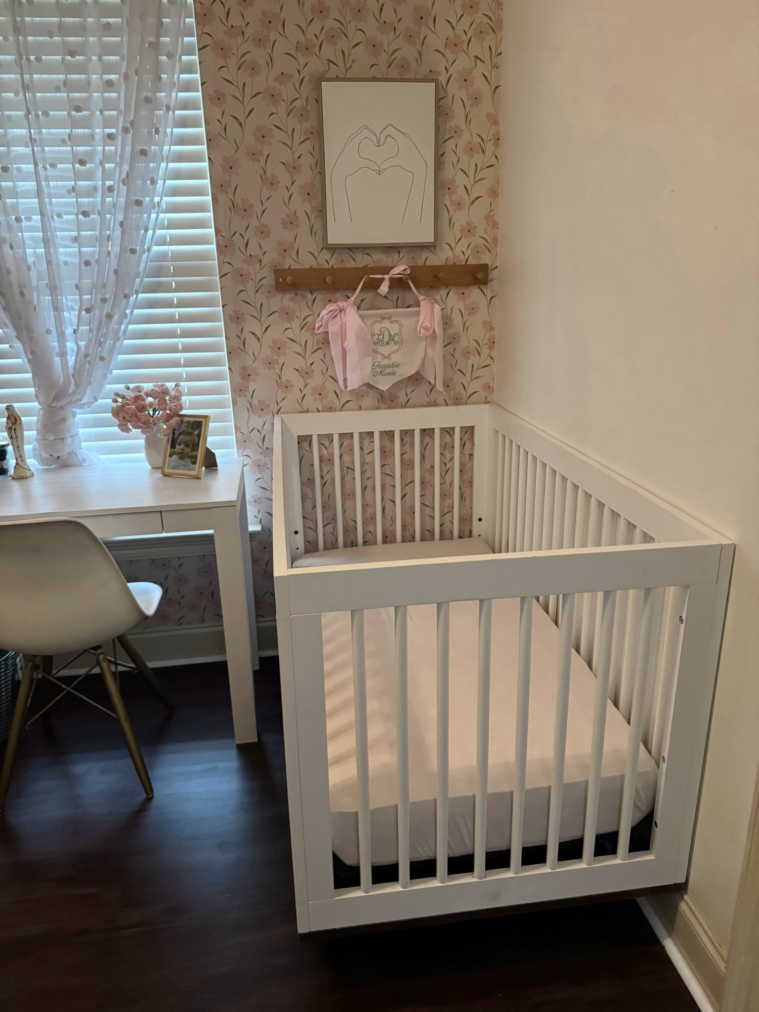 Sweet crib for baby girl. She gets to share a room with big sister for awhile. Fingers crossed she sleeps well in their adorable girls bedroom. Don’t you just love the wallpaper too? 

#LTKKids #LTKBaby #LTKHome