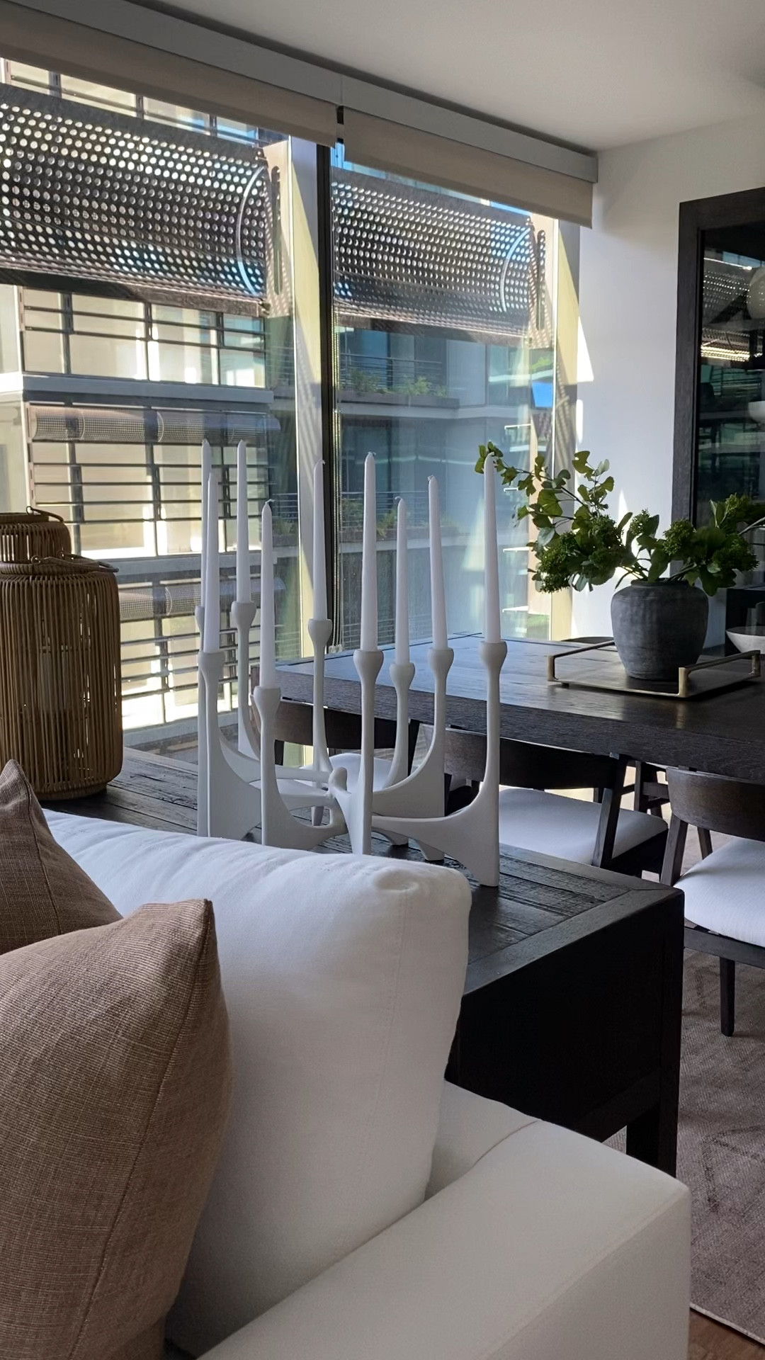 Desert modern styling🌵

Candelabra, brass tray, rustic vase, glass cabinet 

#LTKHome