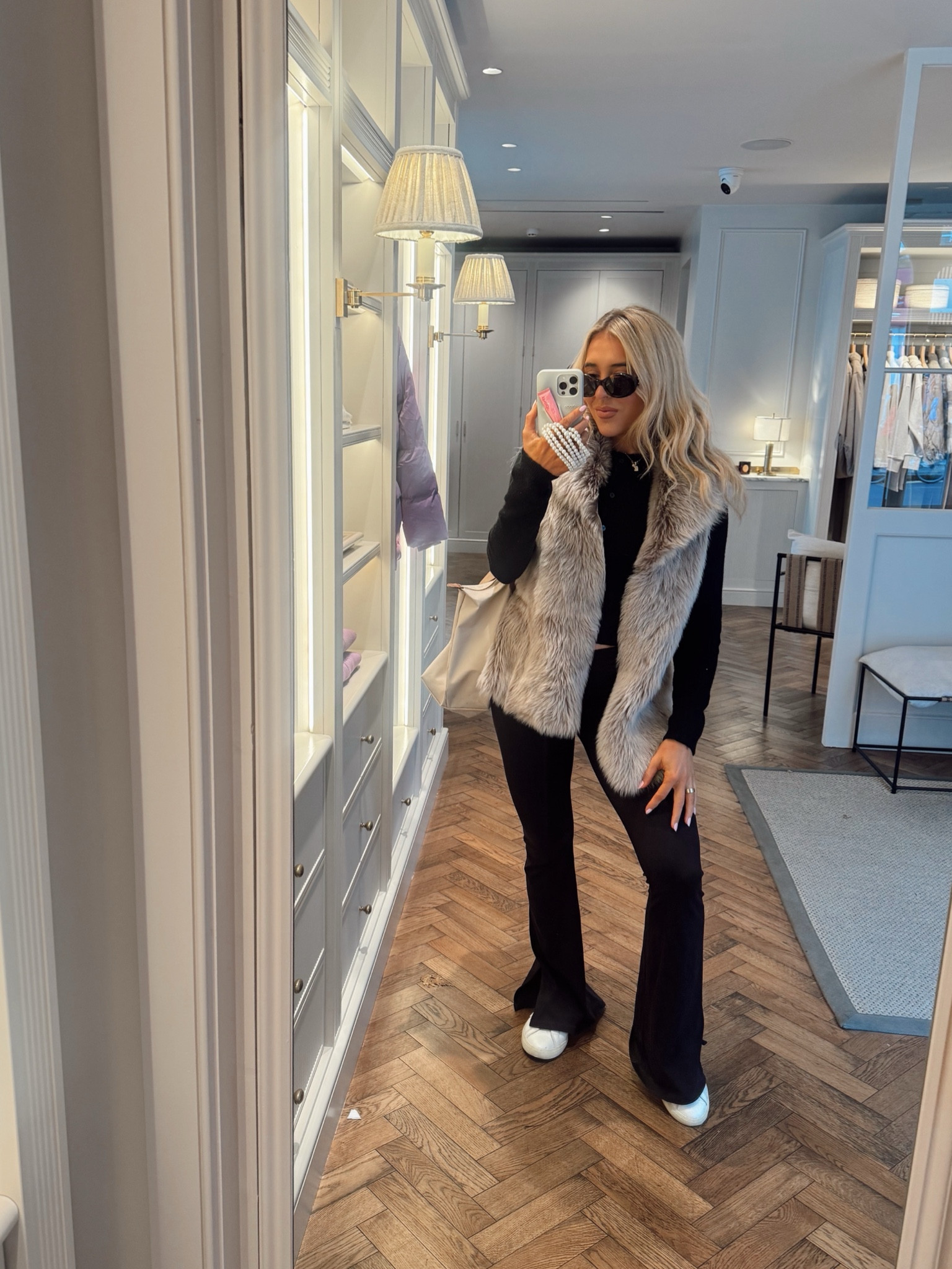 Fur gilet - fur gilets - all black outfit - flared pants - winter outfit - ski outfit - trainers - celine sunglasses - long champ bag - longchamp le pliage tote bag - longchamp bag - winter outfit ideas - skiing outfit 

#LTKeurope #LTKwinter #LTKstyletip