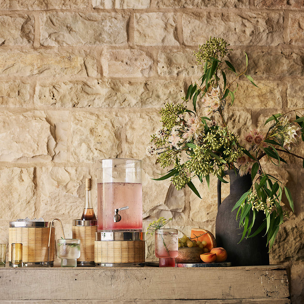 Amici Wicker Cocktail Shaker | Crate & Barrel | Crate & Barrel