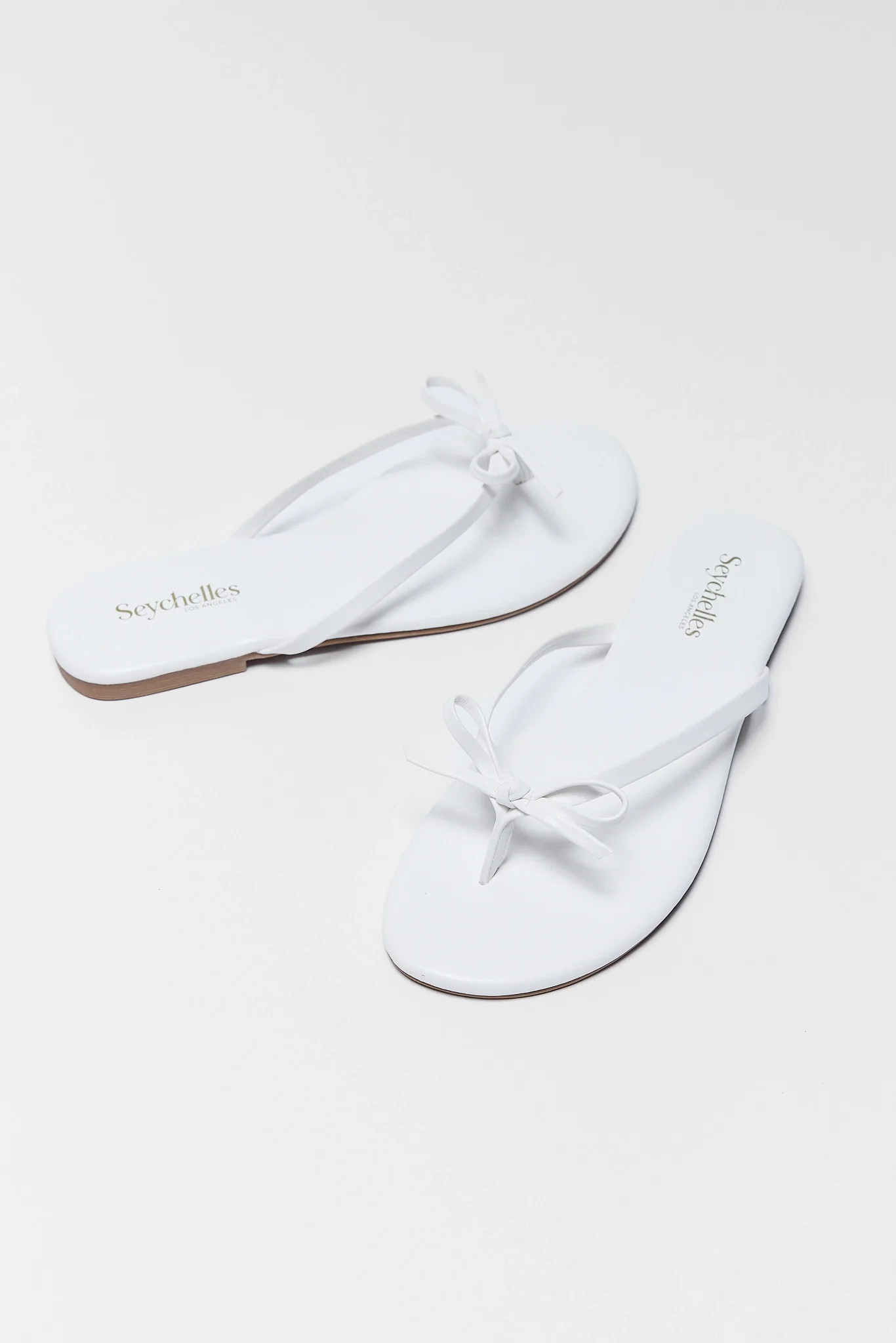 Wish List White Bow Sandals by Seychelles | Avara
