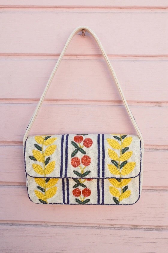 Made for sunlit escapes and effortless styling — this beaded shoulder bag feels like something you’d find in a boutique abroad. Under $60.

Keywords:

* beaded shoulder bag
* ivory shoulder bag
* statement handbag
* multi print bag
* artisan bag
* boho handbag
* fashion shoulder bag
* decorative handbag
* vacation outfit accessory
* travel bag style
* summer accessories
* brunch outfit bag
* resort wear accessories
* event outfit styling
* everyday statement bag
* influencer fashion accessory
* boho luxury aesthetic
* artisanal fashion
* boutique style accessories
* vacation chic style
* editorial accessory styling
* textured fashion pieces
* elevated bohemian style
* statement accessory aesthetic

#LTKTravel #LTKMothersDay #LTKSaleAlert