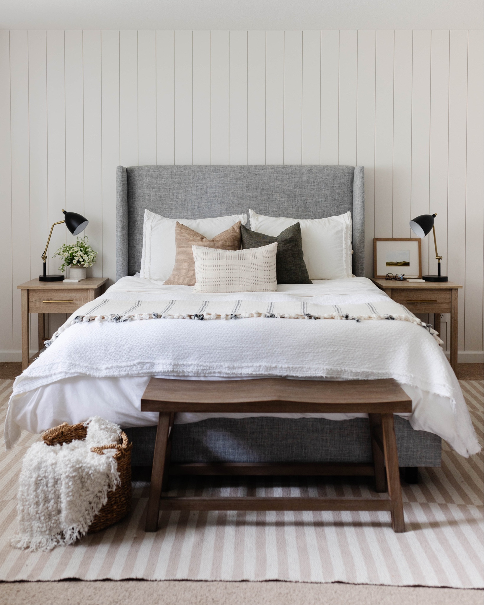 Simple bedroom design with gray upholstered bed, white bedding, and light wood tone nightstand with brass drawer pulls.

Note: I swapped the pulls that came on the nightstands for brass! 



#LTKhome #LTKFind #LTKstyletip