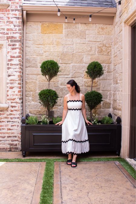 Black and white sun dress from Amazon for under $50! Also check out the plans for the diy planter box on the blog! 

#LTKSeasonal #LTKfindsunder50 #LTKwedding