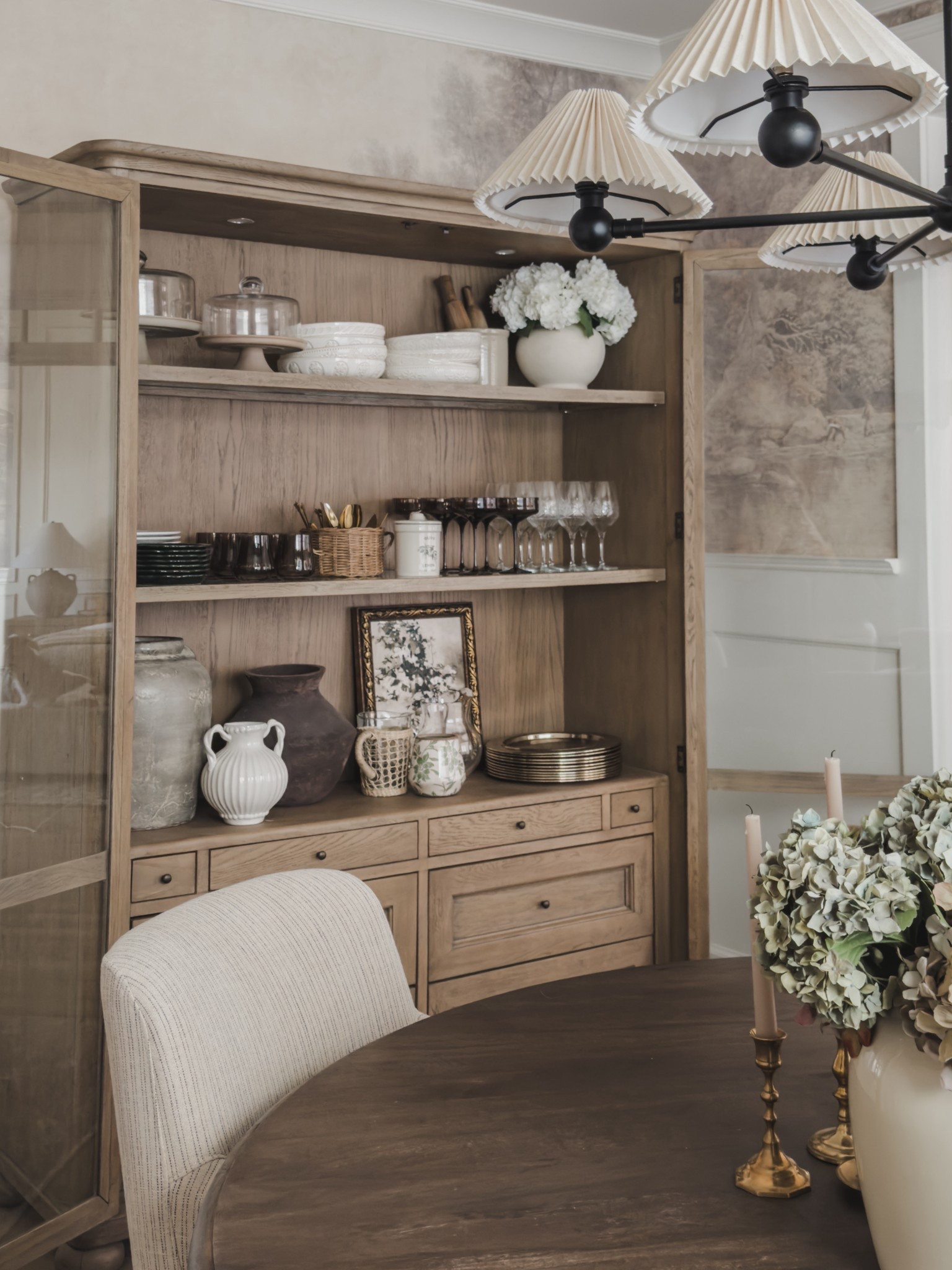 Dining hutch views featuring a mix of collected, aesthetic, and functional pieces for this space. Love how this all came together for a stylish view with all of my favorite pieces.

Home finds, neutral home inspo, dining room views, collected style, timeless dining room inspo, furniture favorites, rich wood tones, neutral wood tones, upholstered dining chair, dining hutch, mural wallpaper, dining hutch style, Four Hands, Etsy, Pottery Barn style, Wayfair, Amber Lewis, Target style, found it on Amazon, shop the look!


#LTKSeasonal #LTKHome