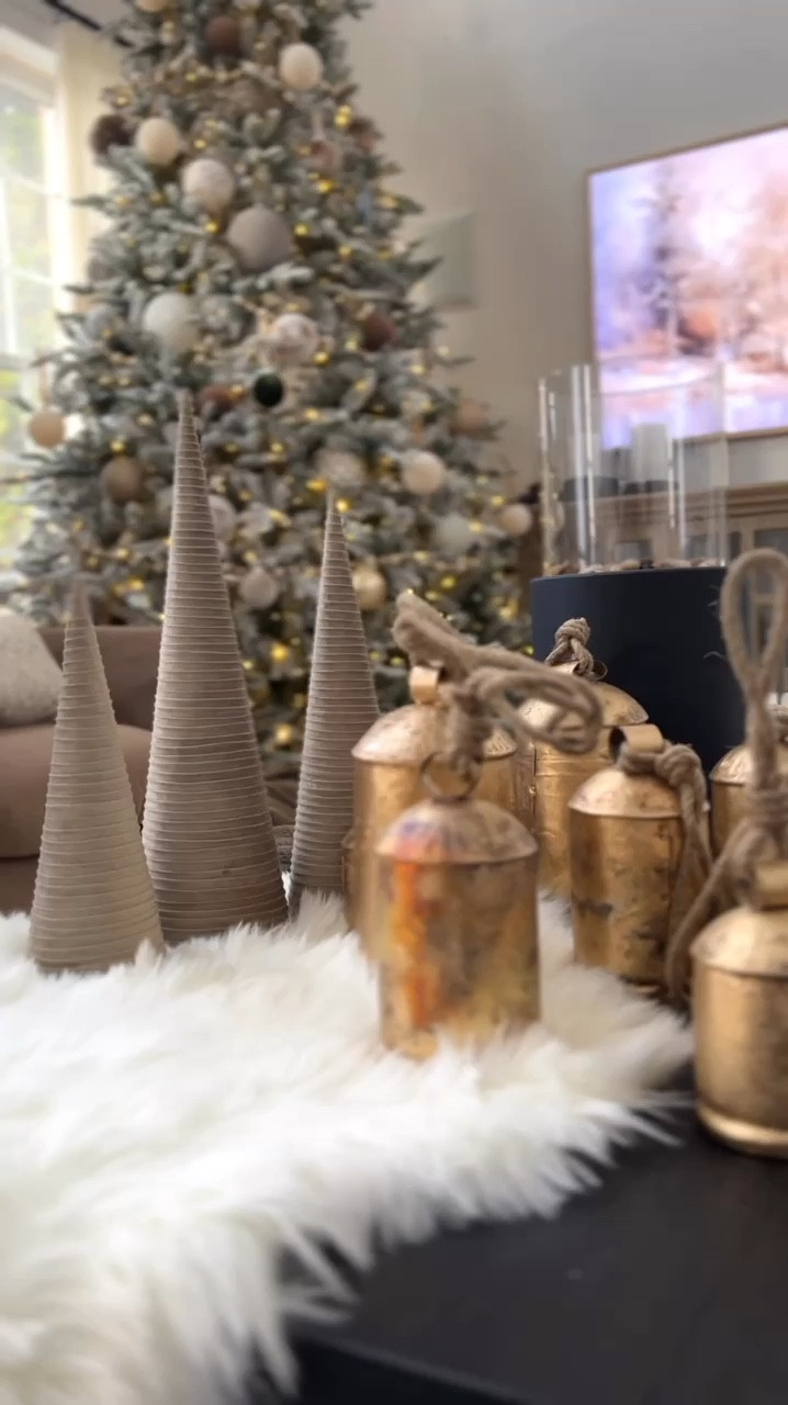 Supplies:
3 different size cones (I bought mine from Hobby Lobby and linked similar ones)
Ribbon
Glue gun + sticks

I added a dot of glue at the top and began wrapping the ribbon around and just occasionally adding another dot of glue after wrapping a few rows of ribbon to make sure it sticks.

Christmas decorations, velvet trees, diy, holiday decor, Christmas decor, amazon hom, wayfair, Christmas tree, gold bells

#LTKVideo #LTKHoliday #LTKHome