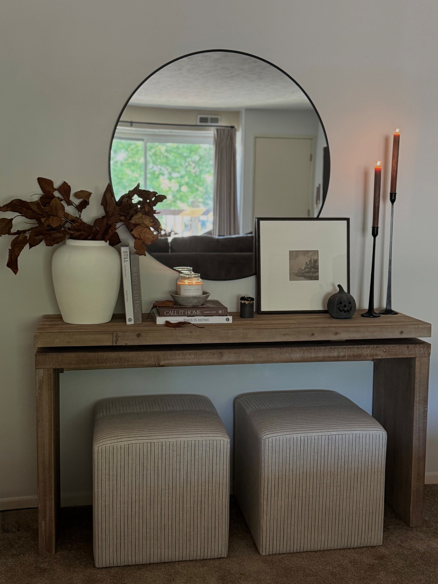 Arwah console, round mirror, hd mirror, lowes, wayfair, wood console table, white vase, luxenhome, magnolia home, magnolia stems, iron taper, black pumpkin, stripe ottomans, coffee table books

#LTKHome #LTKSaleAlert #LTKSeasonal

#LTKSeasonal #LTKHome #LTKFallSale