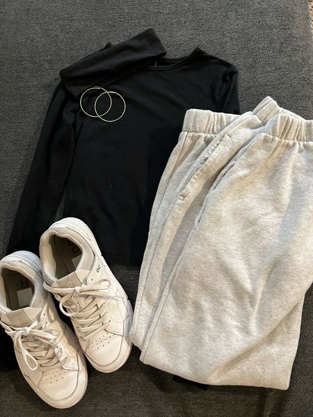Cute neutral winter outfit, black long sleeve, grey sweatpants, white sneakers, headband, gold accessories

Exacts not linked:
 Brandy Melville Light Heather Grey Rosa Sweatpants
Mia Firoe gold hoops from Tjmaxx

#LTKstyletip