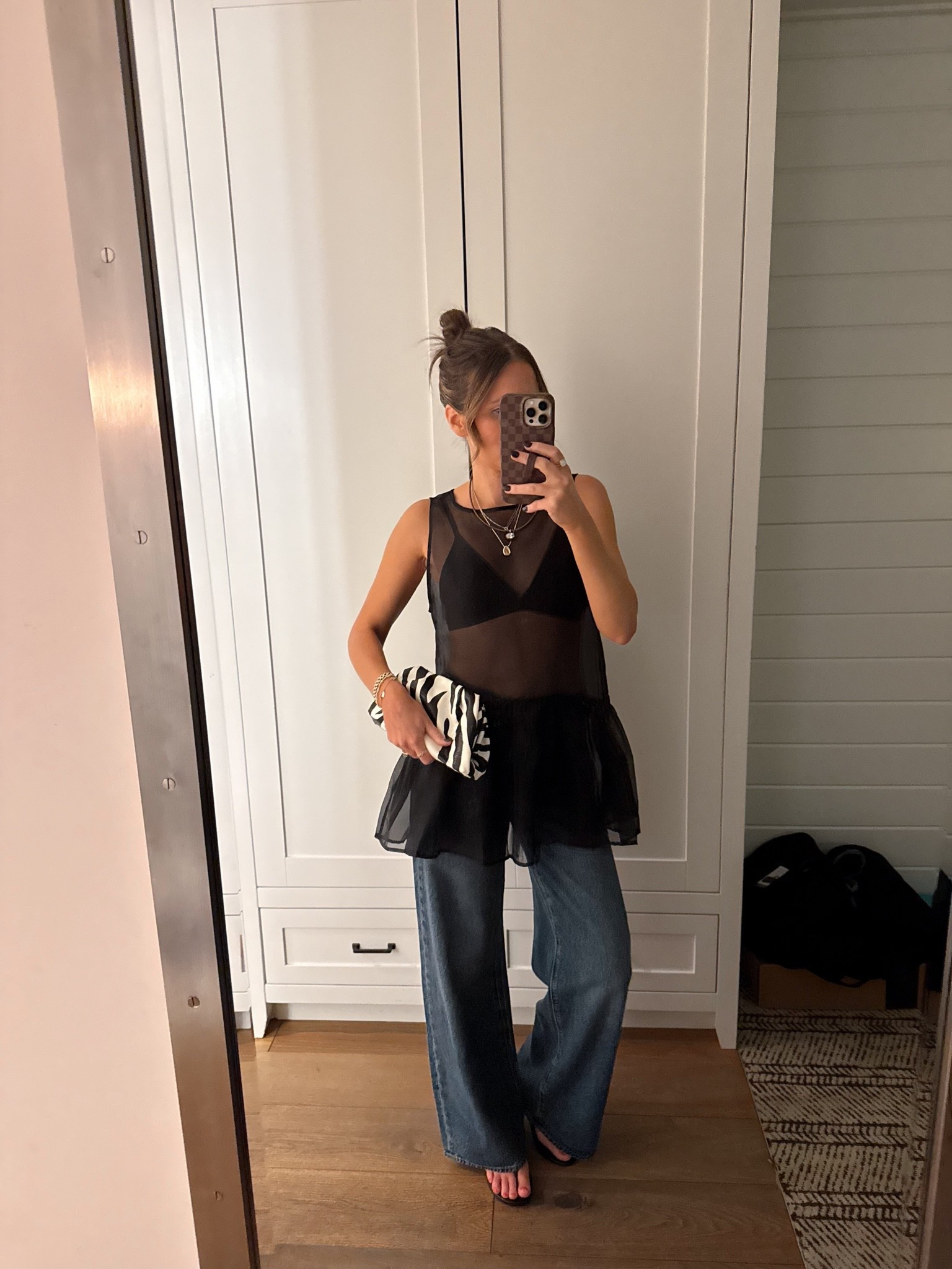 My most requested outfit🤭 the theme for this night was “the wild edit” and I loved the idea of just a pop of print! My top is on the pricier side but absolutely STUNNING. Paired with the comfiest Amazon bralette and my current favorite jeans!

Wearing a size 2 top and size 25 denim
