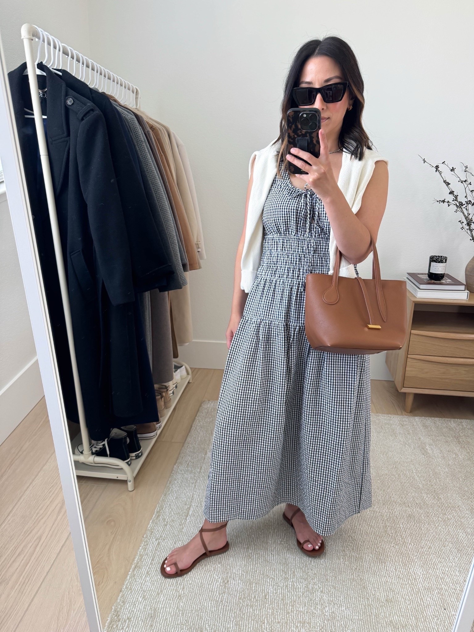 Simple, unlined, very lightweight summer gingham dress. Reviews say this feels cheap, but honestly, it feels like it's great for warm weather.  Love the fit. Runs tts, or size up for a roomier fit. 

Wayf dress small
Tkee sandals 5
Liffner bag
YSL sunglasses
J.Crew earrings
Dorsey James necklace 15"

Petite style, summer style, summer outfits, dresses 