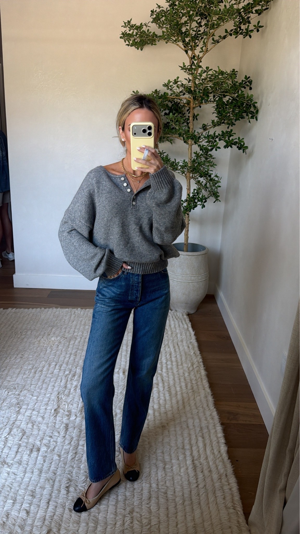 Wearing XS in sweater, 25 in jeans
