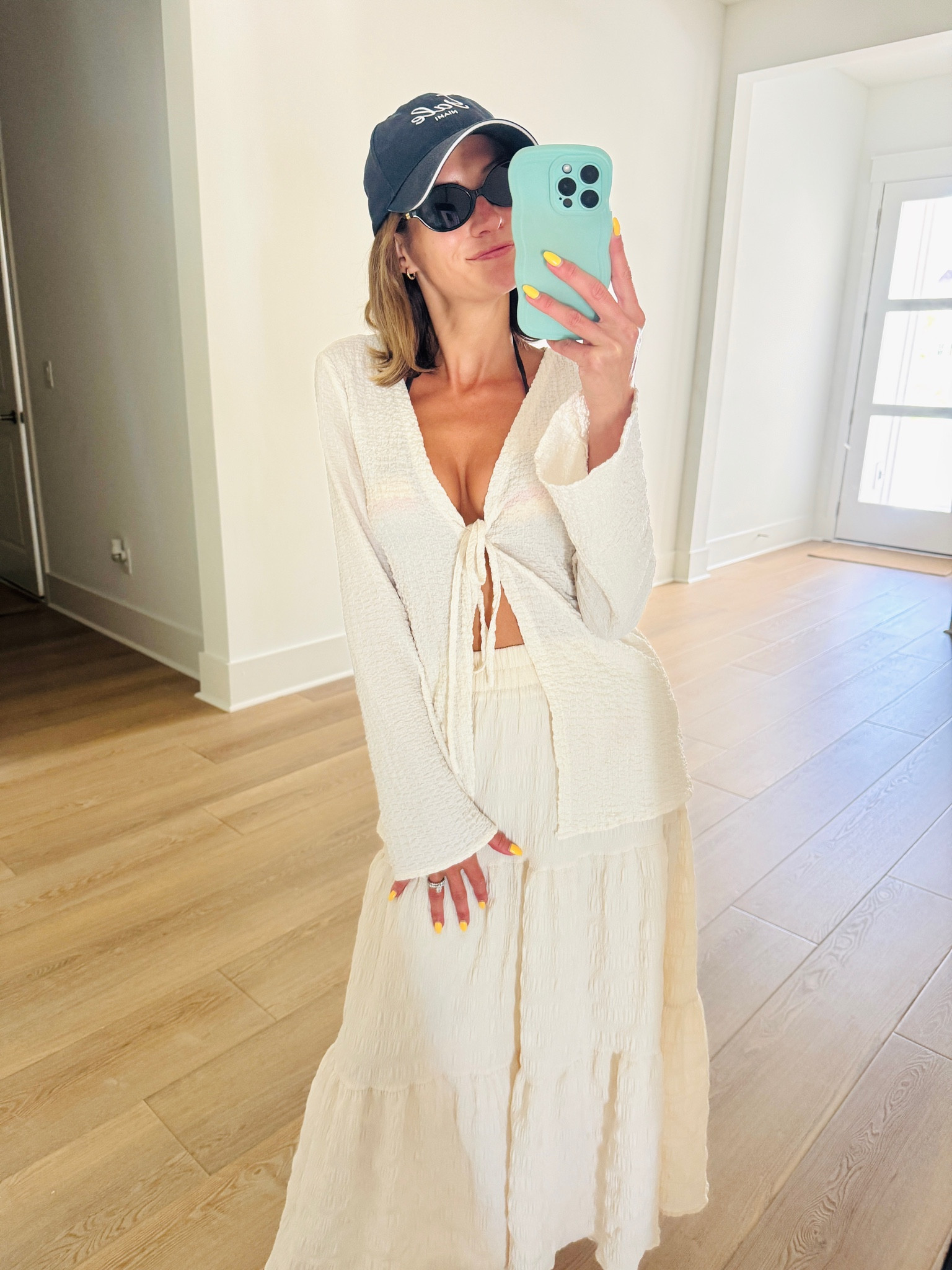 This is my pool cover up outfit all summer long☀️This top is a part of a cover up set that comes with shorts and is offered in more colors! Linking the skirt too.

#LTKootd #LTKmomlife #LTKSwim