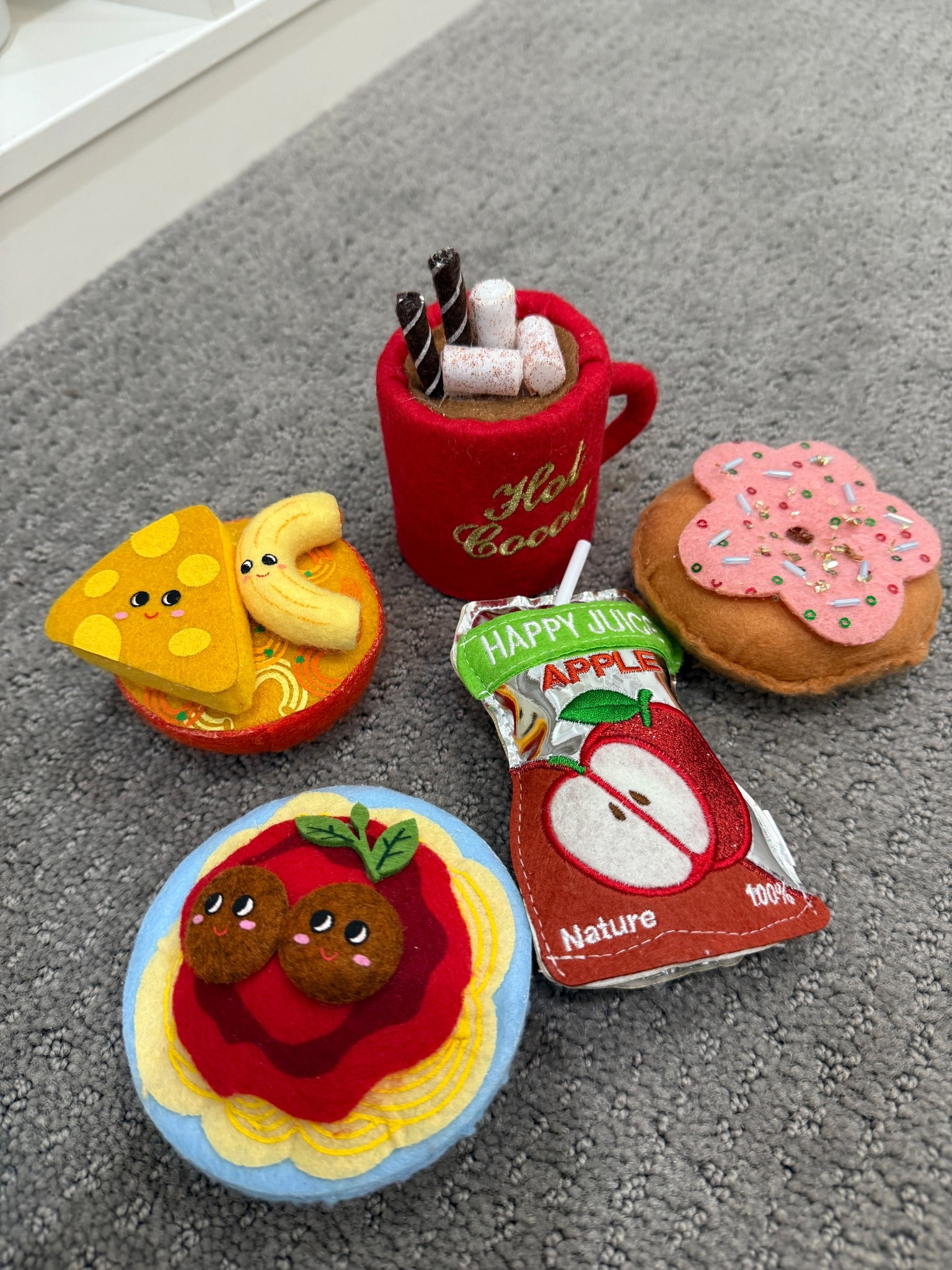 I love buying Felt Christmas ornaments, cutting up the string, and having cute new toy food for our play kitchen in the playroom 

#LTKHoliday #LTKKids