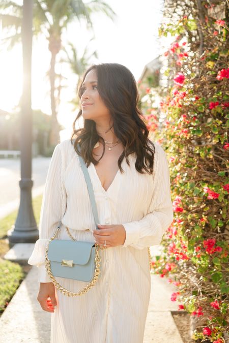How stunning is the @giginewyork Edie bag in capri blue? This beautiful bag comes in 4 new colors and features 2 interchangeable straps: adjustable shoulder strap & a lavish gold chain. You can even remove both straps and wear a simple clutch. Perfect for spring soirées and summers weddings.
 take 15% OFF my bag with code: HAUTE15
#giginewyork #spring #palmbeach #handbags 

#LTKitbag #LTKstyletip #LTKSpringSale