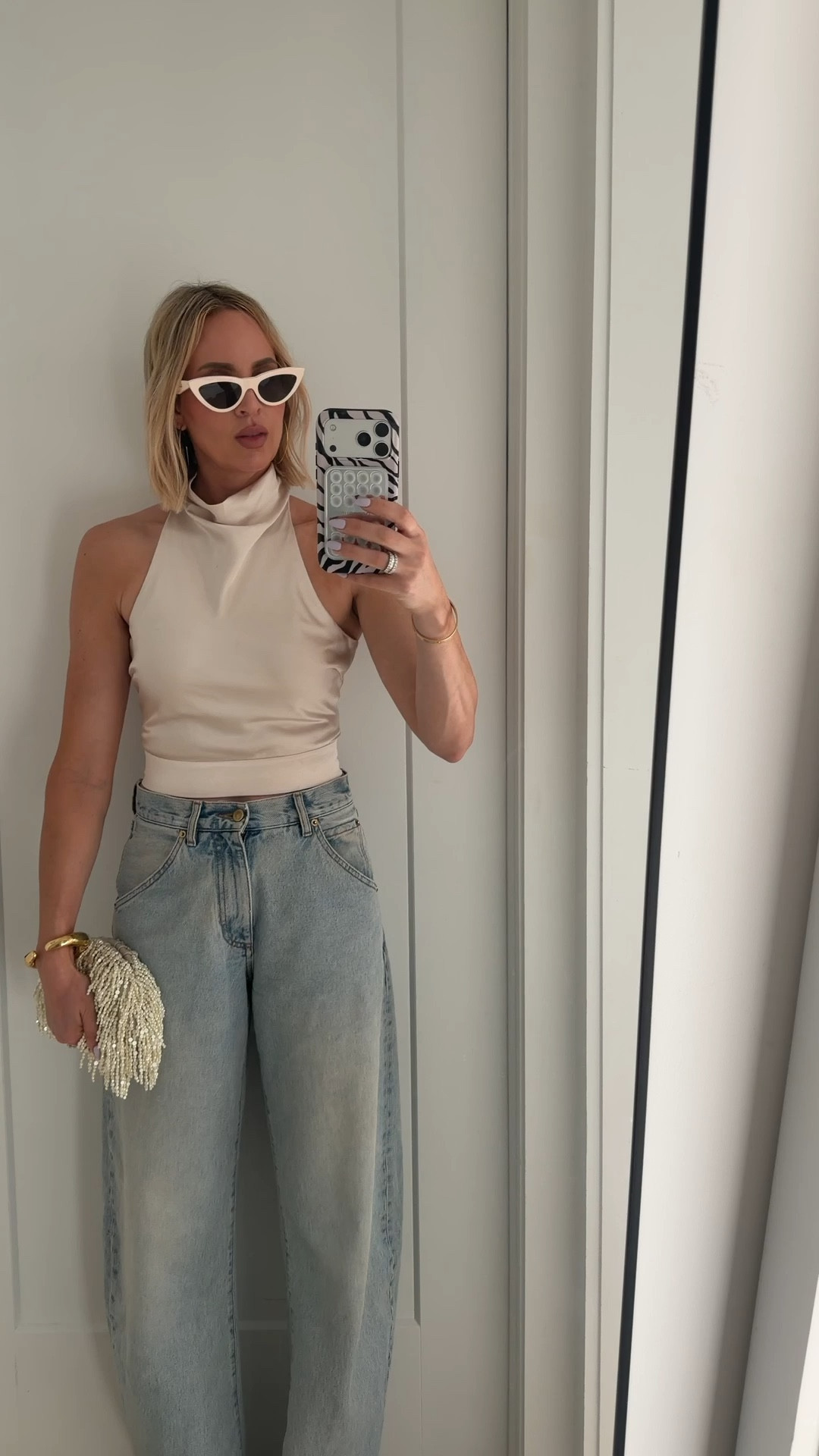 This top is old from Zara, but the one that I linked below looks identical, just the bottom part is more flowy. Wearing a small. Jeans run tts

#LTKdayinmylife #LTKWorkwear #LTKootd