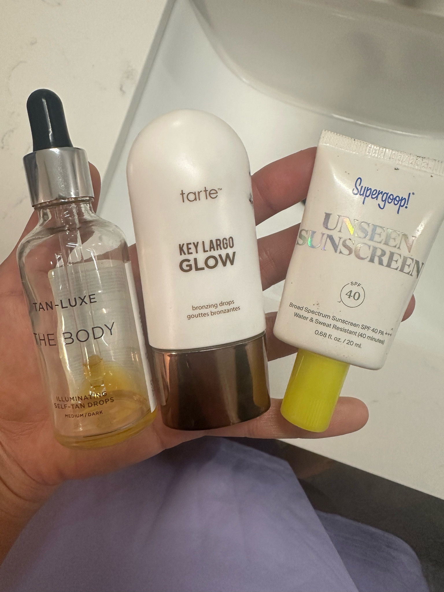 I love using these products especially for a “no makeup” natural look when I plan on being outdoors all day!

Tanning drops - I’ve tried several and @tan_luxe & @theisleofparadise are the only ones that don’t make me breakout or make me look orange 🙃

@tarte Key-Largo Glow - I was reluctant at first, but I’ve been reaching for this more and more now that I’ve gotten a couple shades darker for the right amount of glow!

@supergoop Unseen Sunscreen - just buy it, it really is amazing! I’m an oily betch, so I prefer the Unseen versus the “Glow” because it’s matte

Tanning drops the night before, wash the next morning, apply sunscreen (and let it dry), and then apply glow drops for a bronzed look! I’ll top it off with waterproof mascara and maybe some cream blush if I’m feeling fancy 😍

#LTKSeasonal #LTKBeauty #LTKFindsUnder50