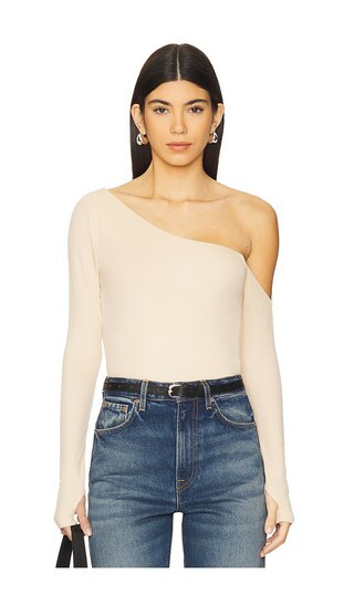 Magdaleno Long Sleeve Asymmetrical Fitted Cold Shoulder Top in Buttercream | Revolve Clothing (Global)