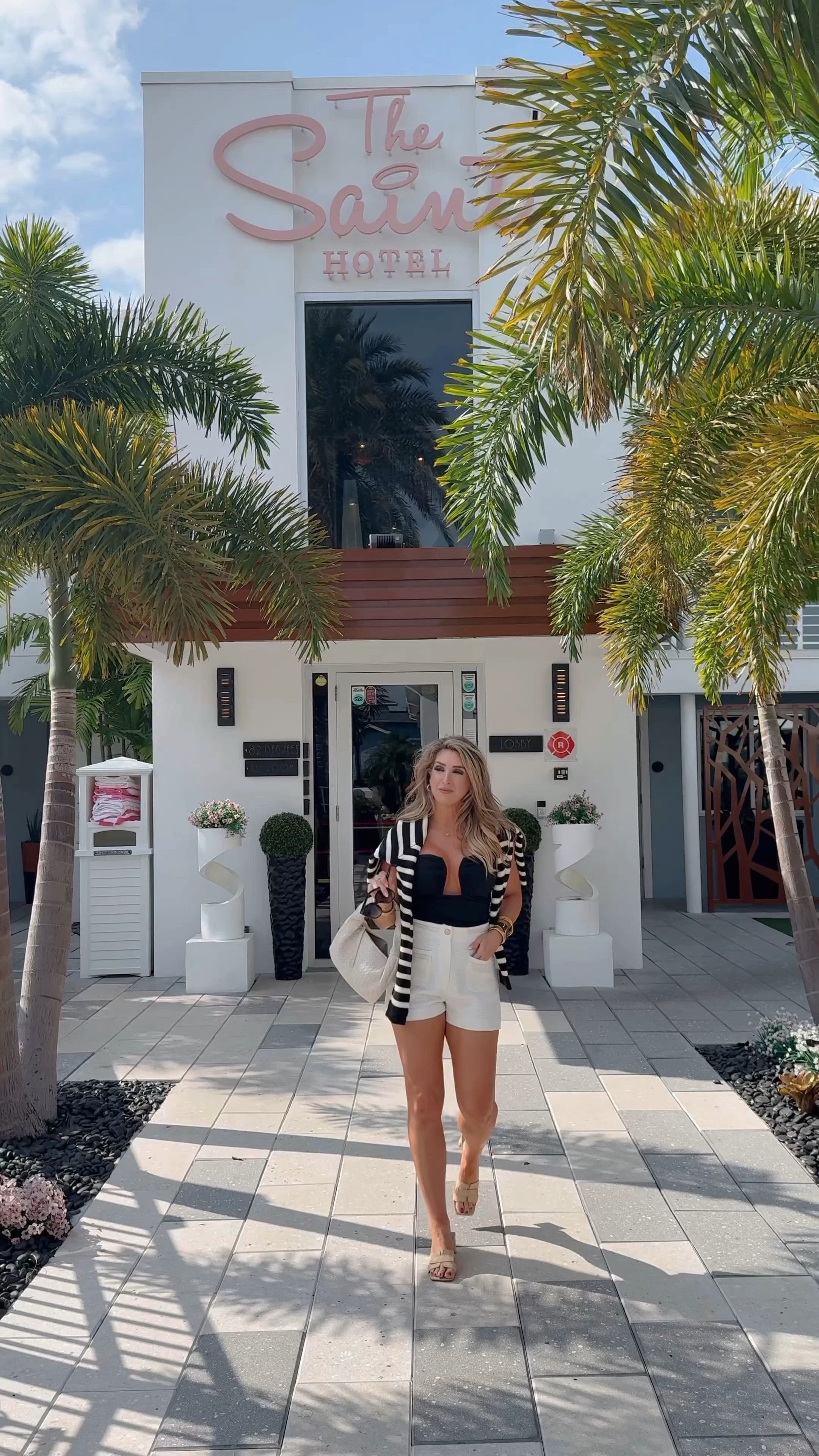 Still soaking up summer. ☀️🌴

Stripe sweater, vacation outfit idea, black bodysuit

#LTKVideo 

#LTKOver40 #LTKStyleTip