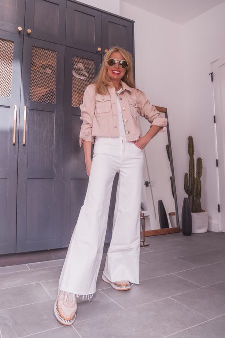 These wide-leg white jeans by Mother are so cool. I love that they are fitted through the hips but baggier through the legs, a very on-trend denim silhouette at the moment. These have a 29.5” inseam so on me, they go almost to the floor and require a small heel or platform. I’m wearing them with a pair of See by Chloe platform sneakers, and you can see that they hit about 1-2” off the ground. Since these have a raw hem, you can cut them yourself if that length doesn’t work for you and/or if you want to wear them with flats. These are meant to be “petite” jeans so the rise is a bit shorter – FYI. I’ll link the regular version as well. 

~Erin xo 

#LTKOver40 #LTKSeasonal #LTKStyleTip