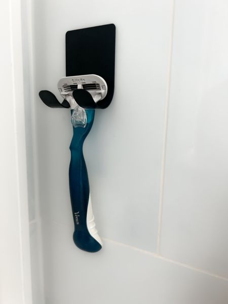 Adhesive razor shower hooks that are great to keep the gunk off your razor blades and make them last longer! Bathroom organization, shower storage, home organization 

#LTKfindsunder50 #LTKhome