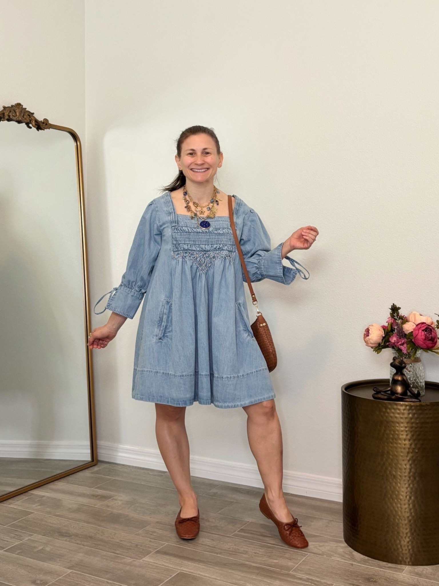 I love this petite friendly denim dress! It is on sale and makes a perfect spring to summer dress. ￼This dress comes in a few different colors and styles, including a darker denim shade. It hits just above my knees in the extra small size, I’m almost 4‘10“.

#LTKootd #LTKSpringSale #LTKPetite