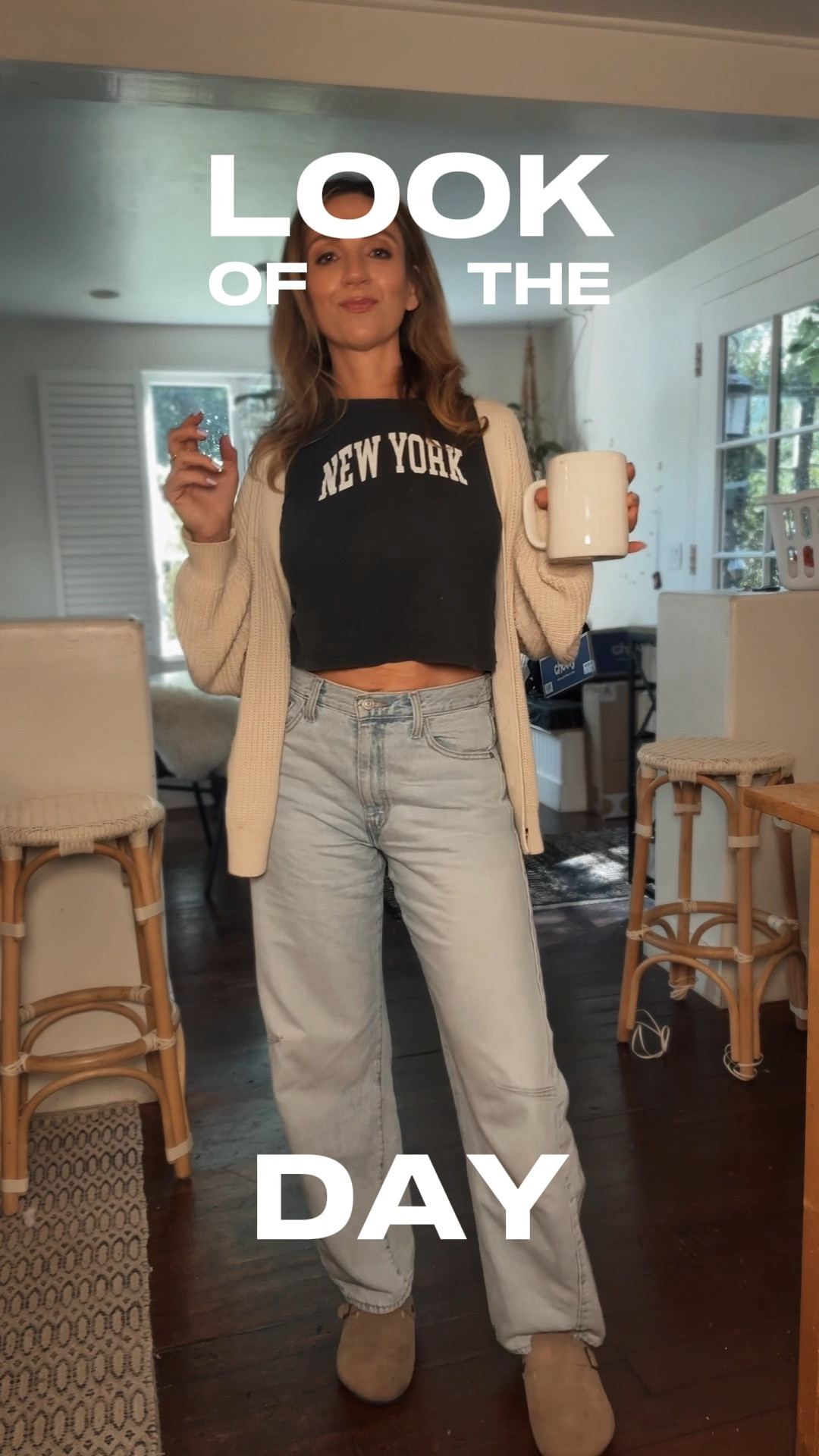 Easy spring outfits on repeat 🤍 these @Levi's  cinch waist barrel jeans are one of my favorite finds lately. So flattering with the adjustable waist. Styled with a cropped tee, a relaxed boyfriend sweater, and my cozy fur-lined clogs (trust me, you don’t need the expensive version). 

🌼spring outfits 2026

#LTKootd #LTKmomlife #LTKOver40