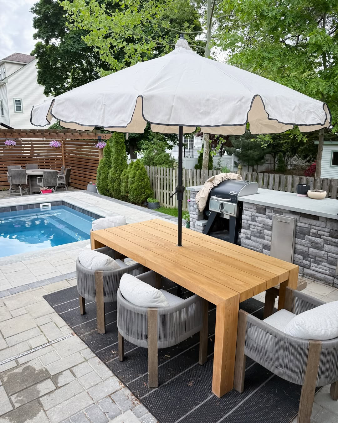 Just scored this super adorable umbrella for under $90 -- it gives this space a total wow factor that I'm absolutely loving!

outdoor patio furniture
poolside lounge chairs
wicker conversation sets
outdoor dining furniture
patio umbrella decor
backyard fire pit seating
modern outdoor sectionals
poolside cabana chairs
summer patio refresh

#LTKSeasonal #LTKHome #LTKSaleAlert