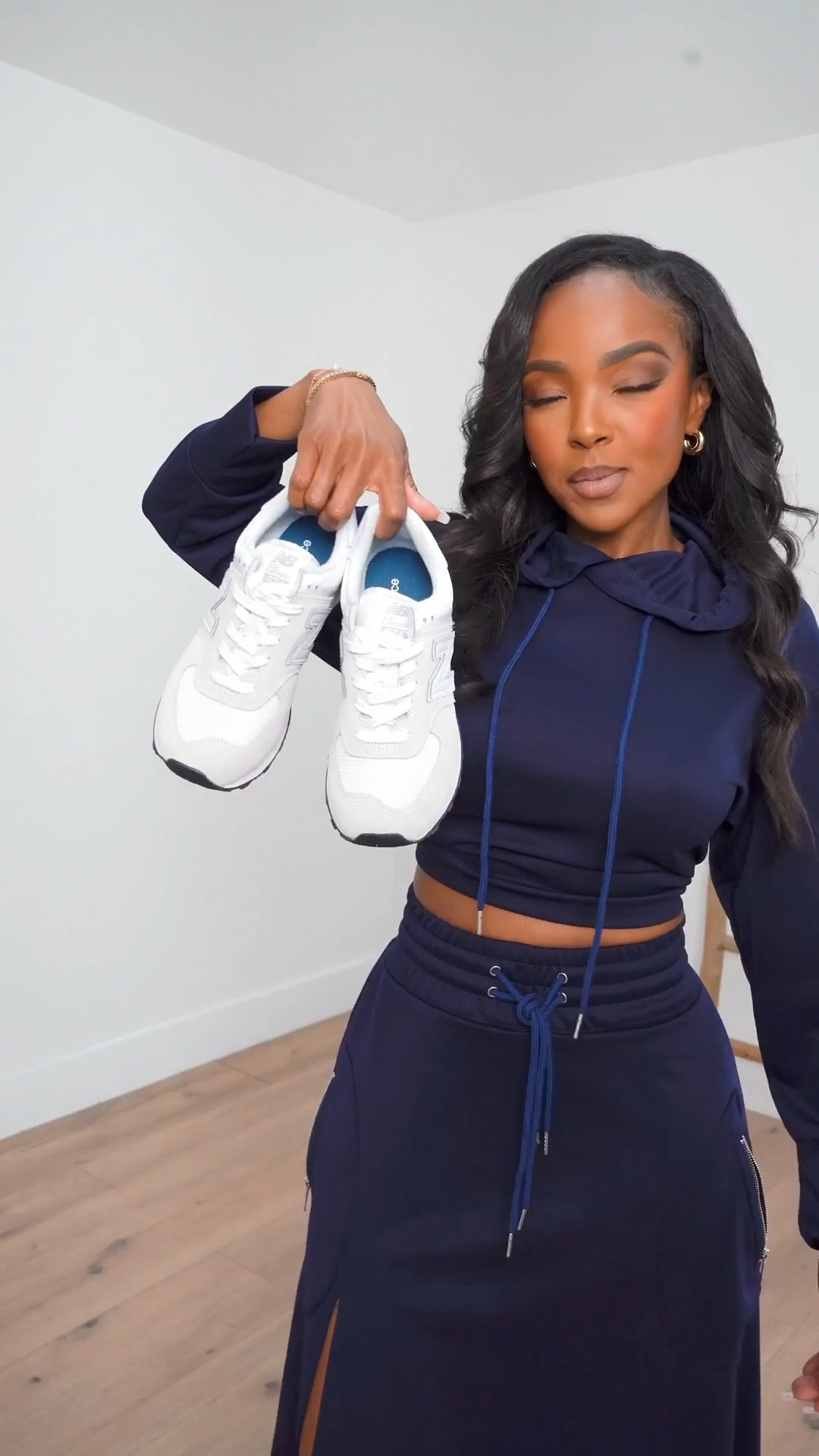 Sporty meets elevated in this navy set that proves comfort and style can absolutely coexist. The cropped hoodie and flowy maxi skirt combo gives effortless cool while still feeling polished and intentional.

This is one of those outfits that works hard for your wardrobe — styled multiple ways so the cost per wear drops fast. Dress it up with a mini bag or keep it casual with sneakers for an easy long-term shopping strategy.

Perfect for travel days, running errands, casual brunch, content days, airport outfits, or laid-back weekends when you still want to look put together.

📏 Sizing & fit details:  
Top: Size Small  
Skirt: Size Small  
Sneakers: True to size  

Measurements: 5'4", 138 lbs, 34D bust, 27" waist, 40" hips

This look fits seamlessly into sporty chic outfits, athleisure sets, casual matching sets, travel outfit ideas, comfortable everyday fashion, modern street style, effortless weekend looks, and elevated casual wear that feels current and wearable.

Shop instantly on the app to get all the details.

Follow me on Instagram and YouTube @kirasfashionfinds 

#LTKPetite #LTKootd