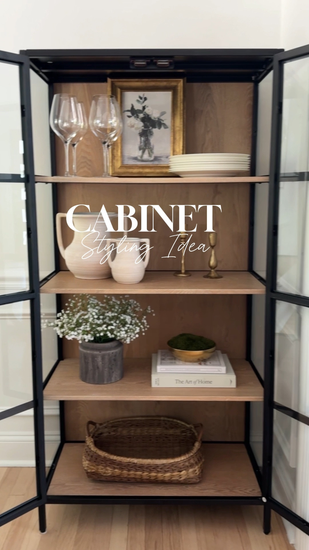 Here is a simple way to style a glass cabinet with beautiful and affordable decor pieces. 🤎

#cabinetstyling #diningroomdecor #stylewithme #targethome #amazon finds 

#LTKHome #LTKStyleTip #LTKVideo