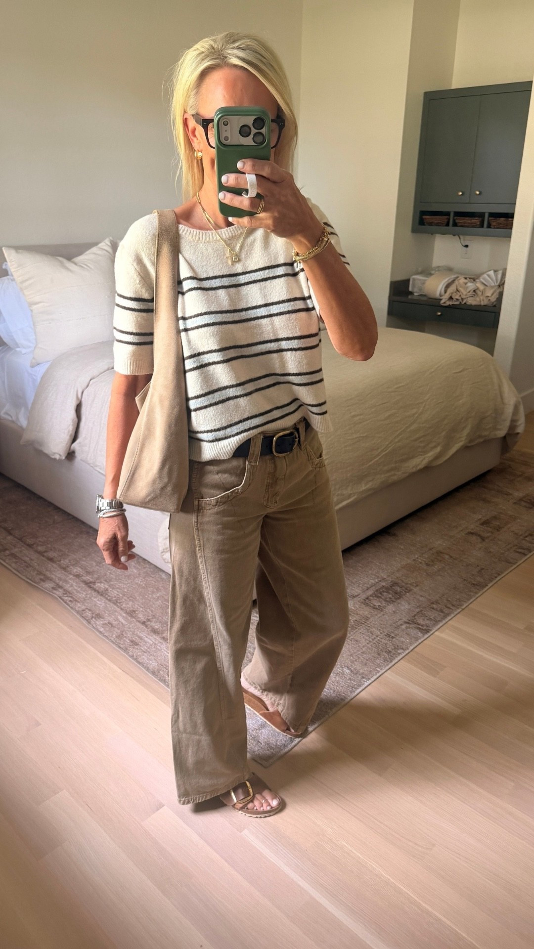 A classic striped sweater is one of those pieces that makes getting dressed so easy. I love how it pairs with these high-rise tapered barrel-leg jeans for a relaxed, polished look that works beautifully for everyday wear.

#LTKootd #LTKOver40