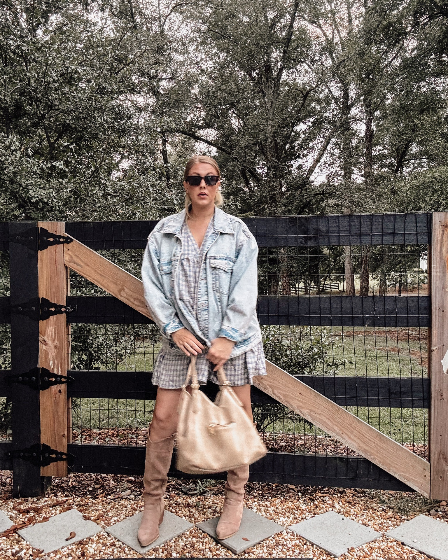 Layered up in plaid, denim, and suede. 🤎