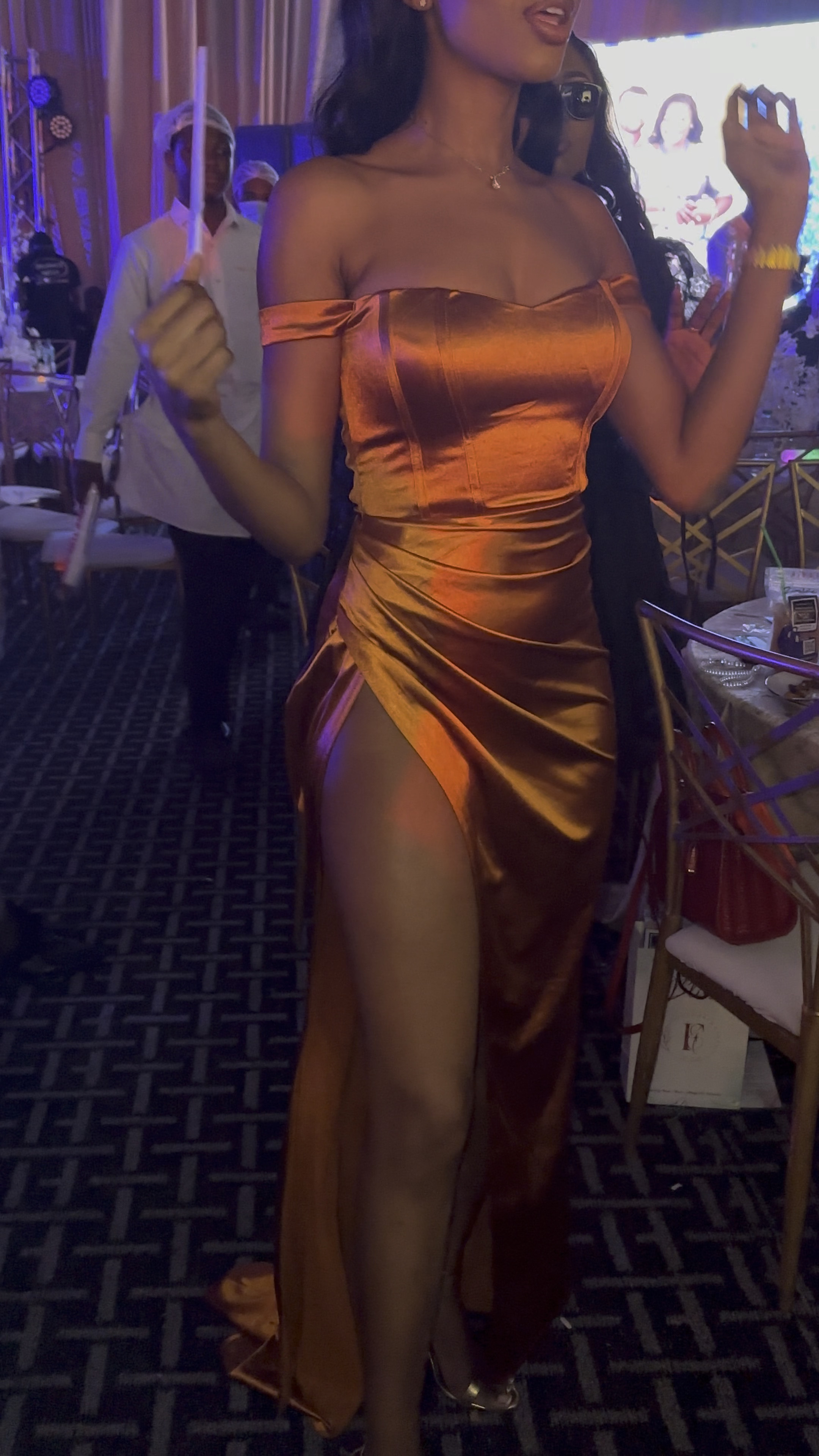 Orange dress with high slit . I ordered a size medium and got it altered to my size so slit won’t be too high. 

#LTKfindsunder50