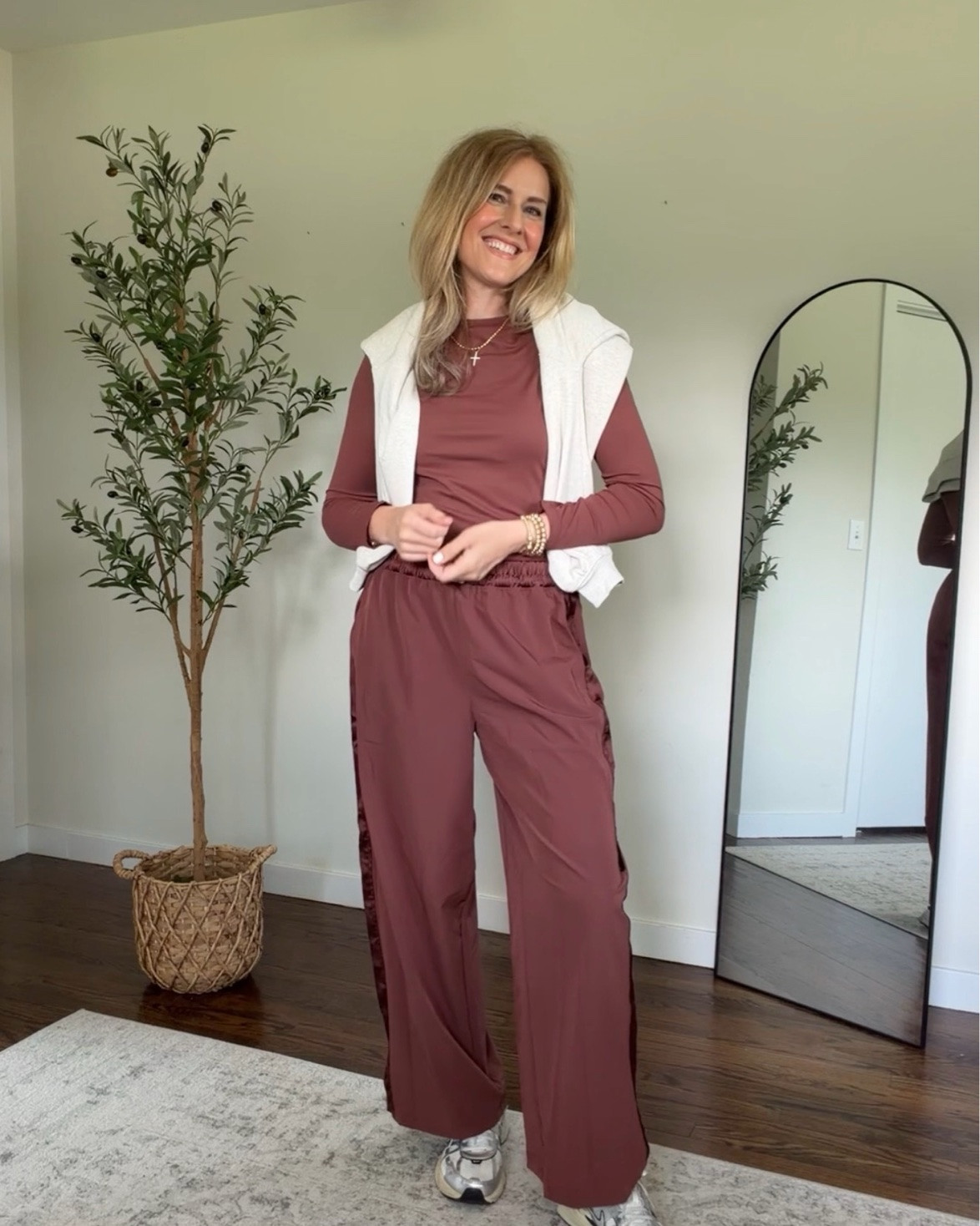 New activewear at Walmart! I went up to size medium in the shirt and pants. Wish the pants were longer, I’m 5’8”. Love the color, comes in several shades! Satin stripe on the pants. Comfy elastic waist. Four way stretch. #walmartfashion

#LTKOver40 #LTKfitnessgoals